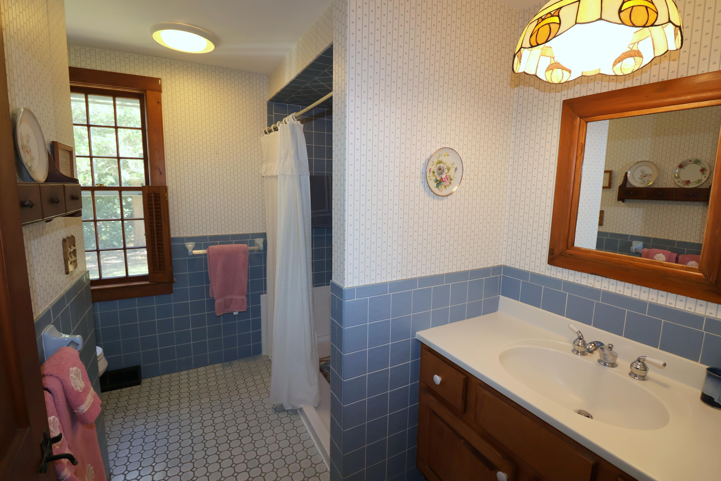 42 Robbins Circle Dennis, MA 02638 - Photo 21 of 46 a bathroom with a sink and a mirror