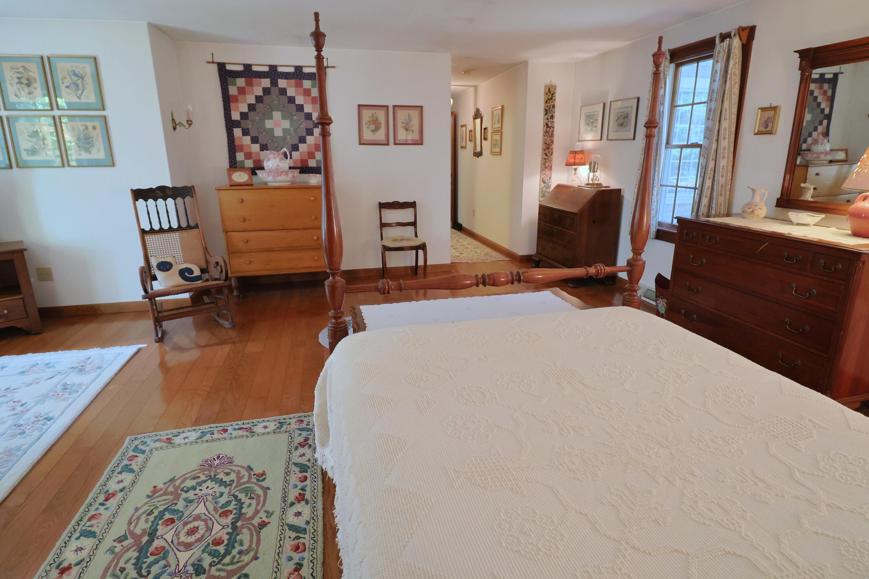 42 Robbins Circle Dennis, MA 02638 - Photo 27 of 46 a bedroom with furniture and a bed