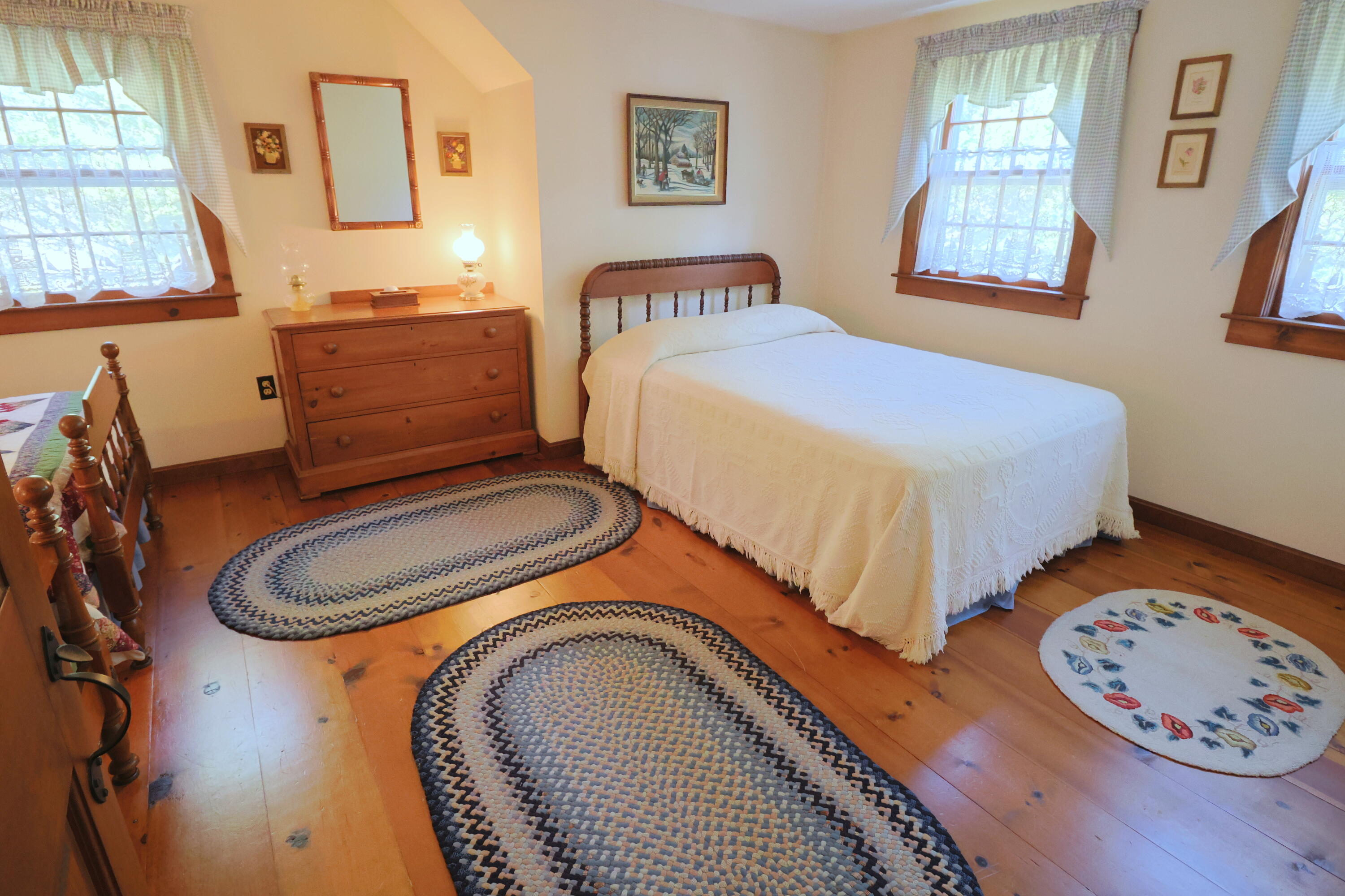 42 Robbins Circle Dennis, MA 02638 - Photo 37 of 46 a bedroom with bed and a window