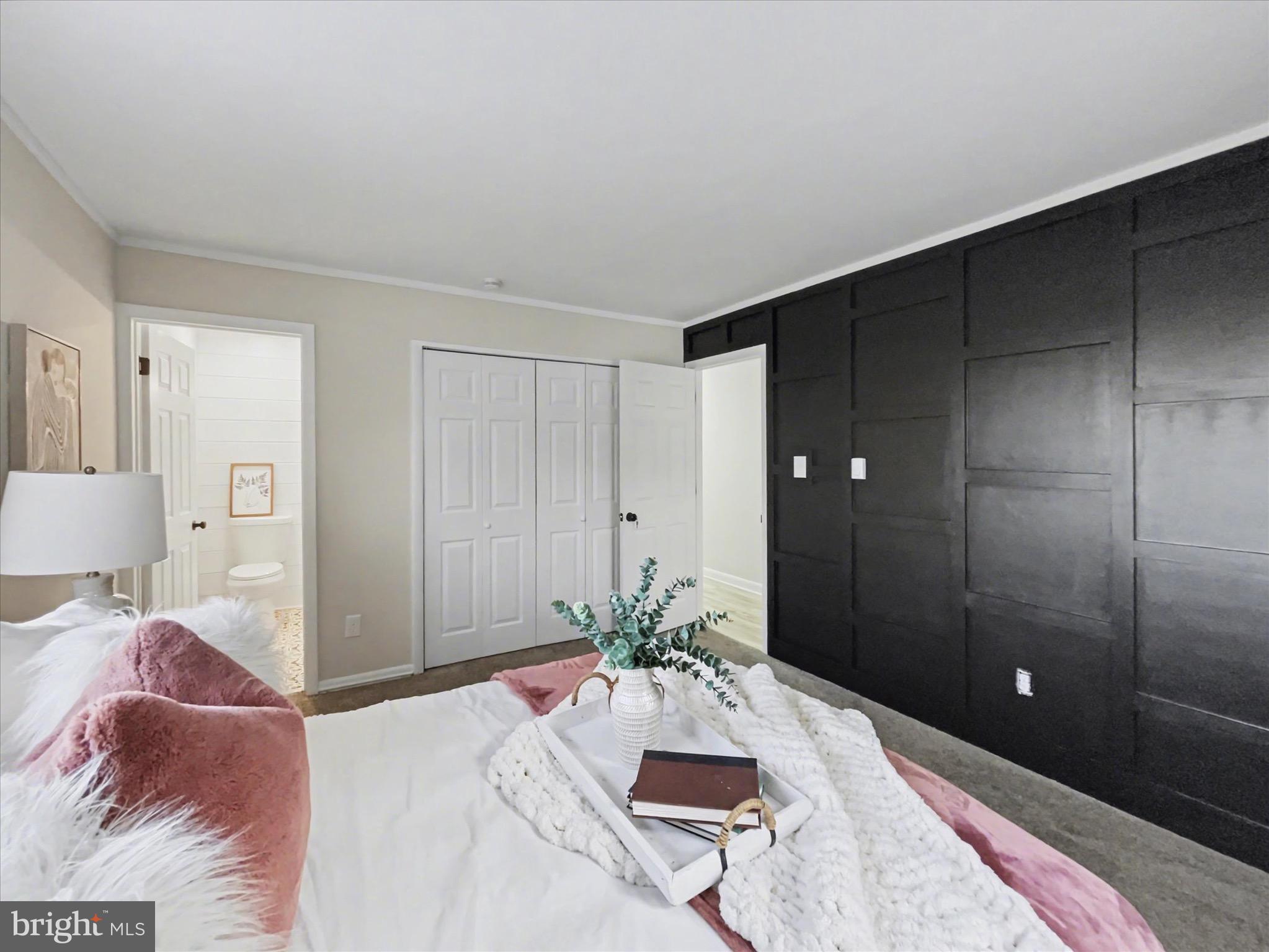 2206 Ridge Road Glenville, PA 17329 - Photo 15 of 23 a bed room with a bed and a potted plant