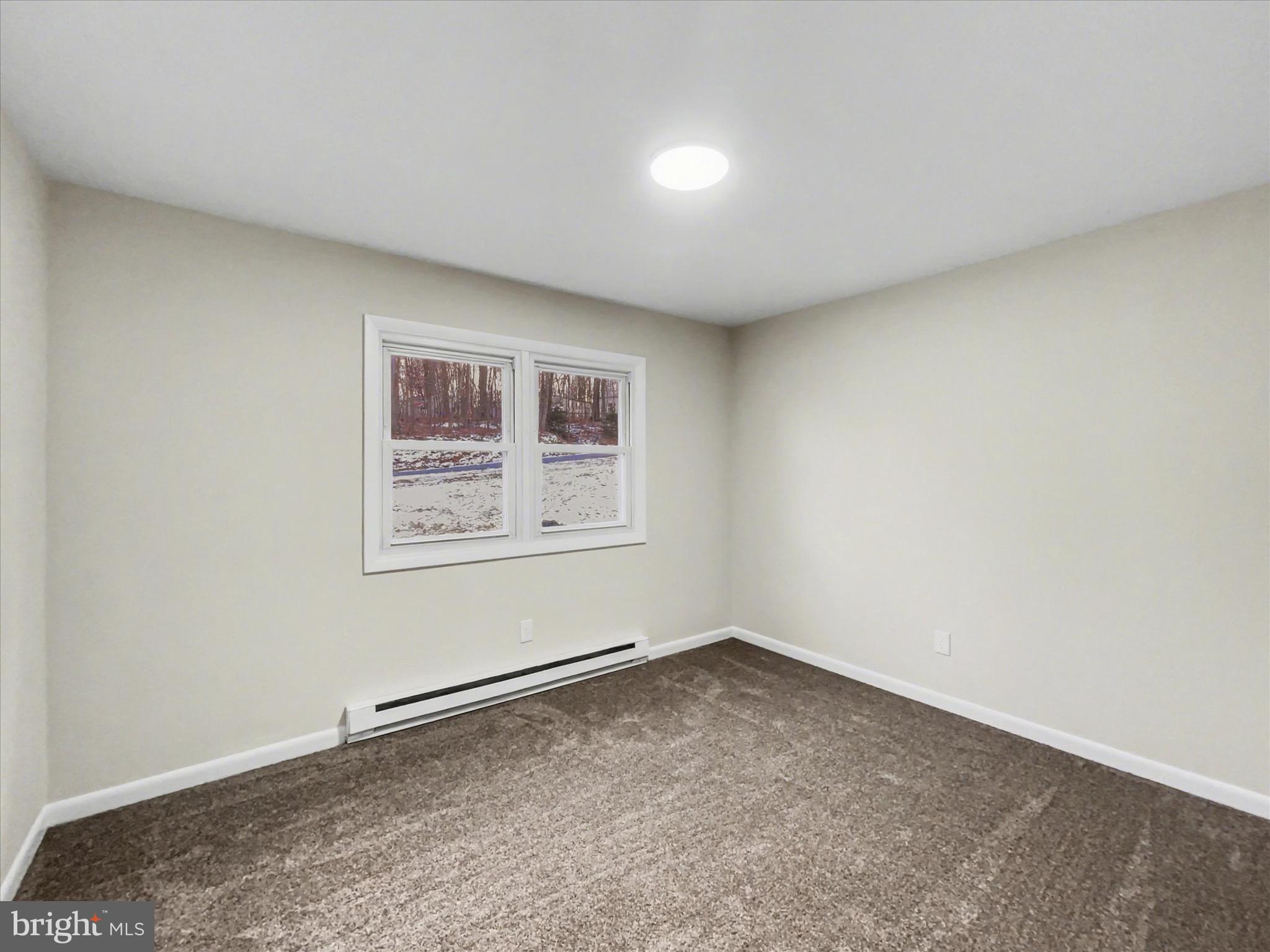 2206 Ridge Road Glenville, PA 17329 - Photo 17 of 23 an empty room with windows