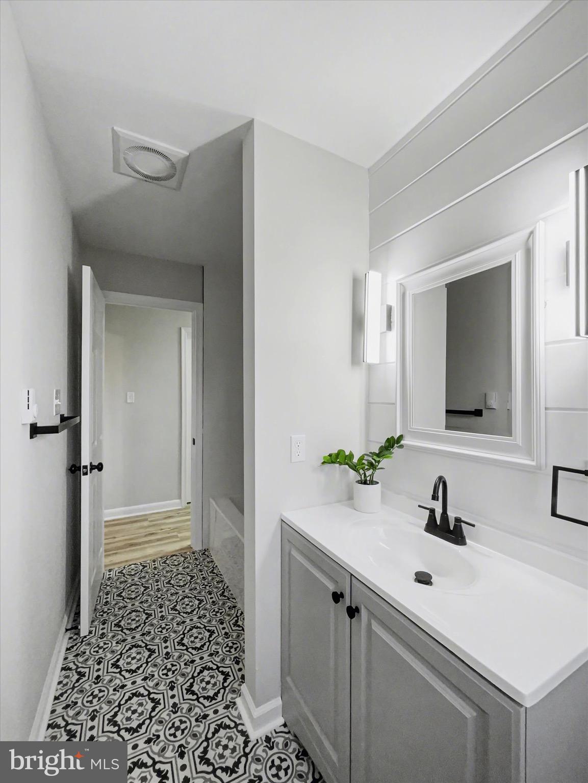 2206 Ridge Road Glenville, PA 17329 - Photo 18 of 23 a bathroom with a sink and a mirror