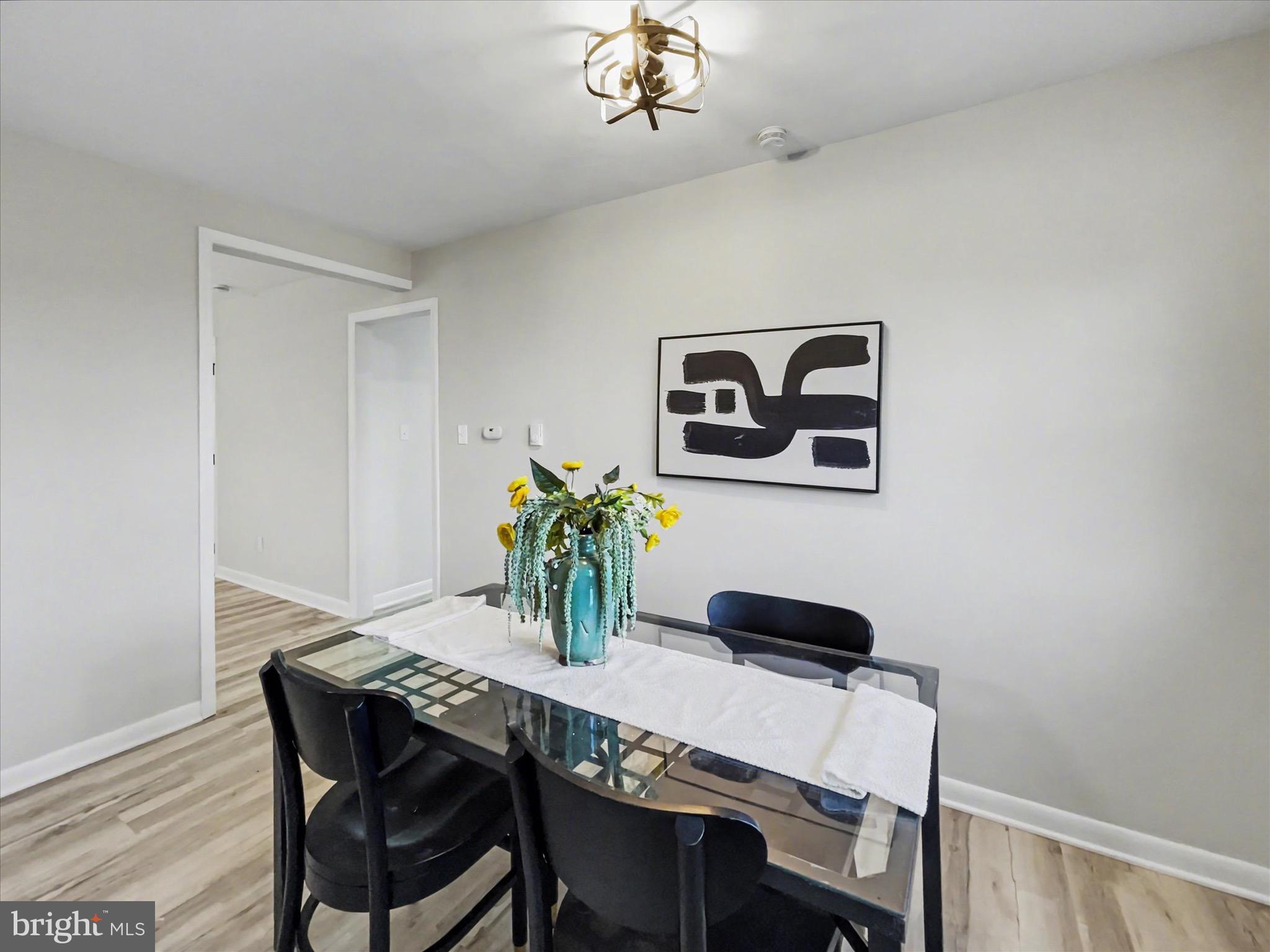 2206 Ridge Road Glenville, PA 17329 - Photo 7 of 23 a dining room with table and flowerpot