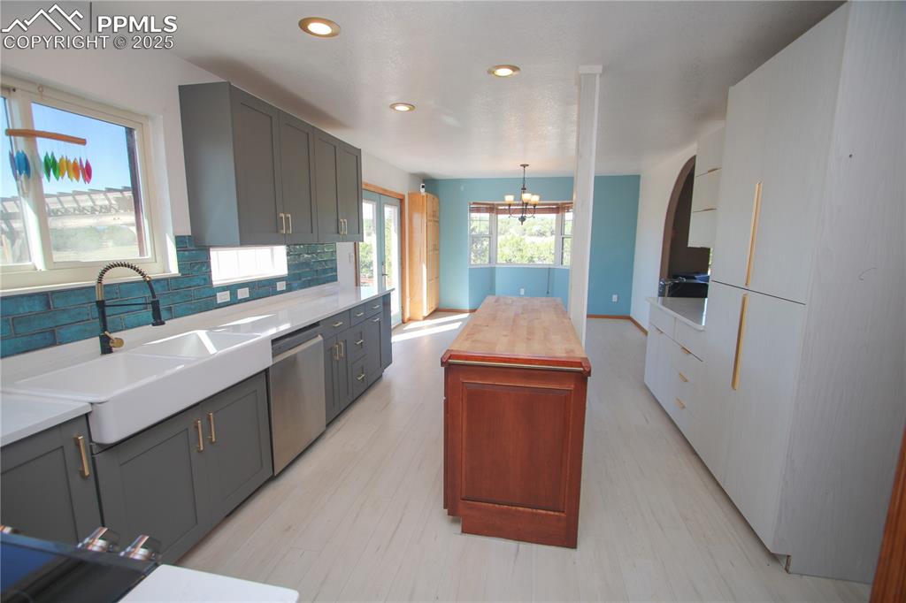 770 Cedar Hills Road Penrose, CO 81240 - Photo 12 of 49 a kitchen with sink a refrigerator and window