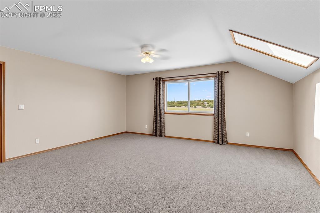770 Cedar Hills Road Penrose, CO 81240 - Photo 24 of 49 a view of an empty room with a window