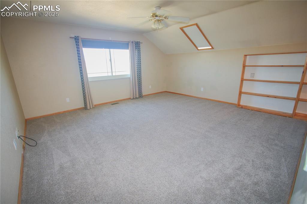 770 Cedar Hills Road Penrose, CO 81240 - Photo 25 of 49 a view of an empty room with a window
