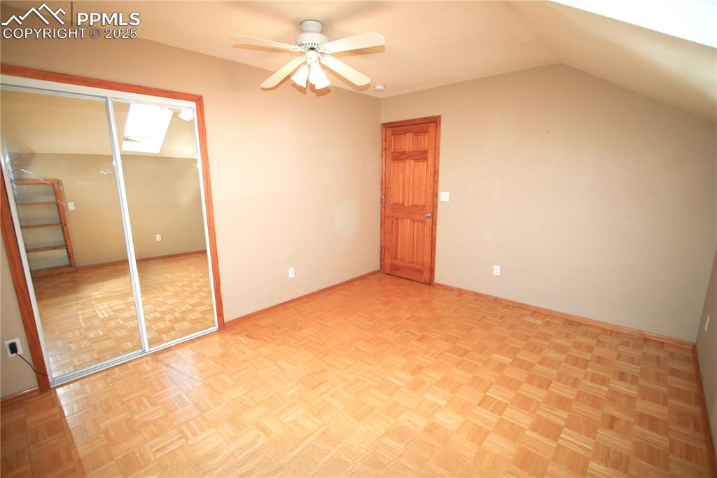 770 Cedar Hills Road Penrose, CO 81240 - Photo 28 of 49 a view of an empty room with a window