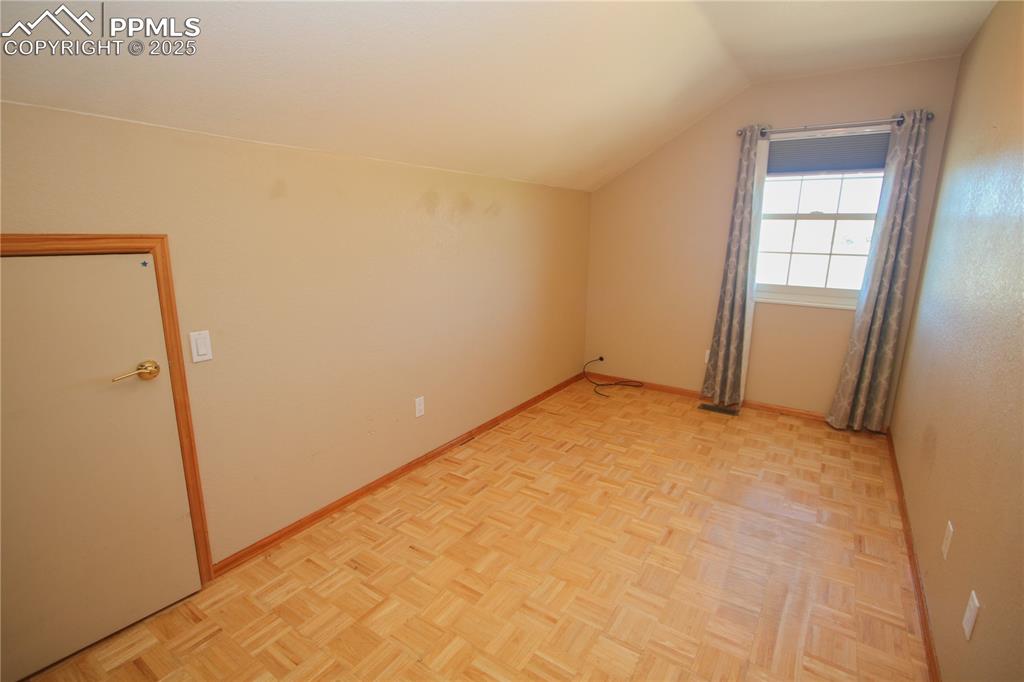 770 Cedar Hills Road Penrose, CO 81240 - Photo 33 of 49 an empty room with windows