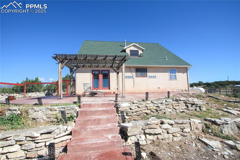 770 Cedar Hills Road Penrose, CO 81240 - Photo 35 of 49 a front view of a house with garden