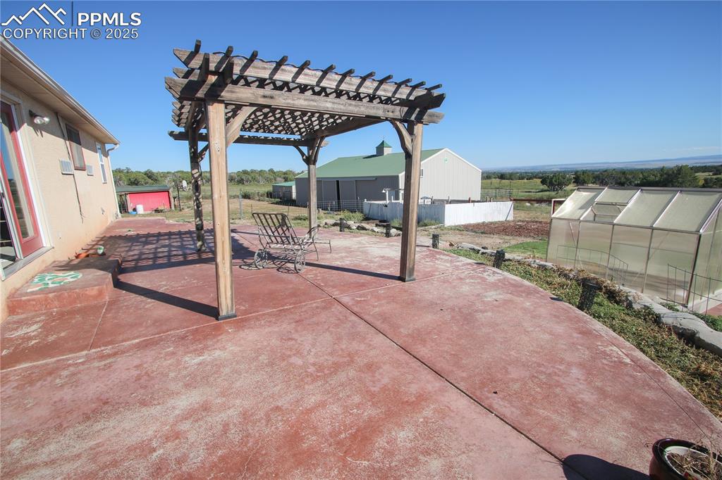 770 Cedar Hills Road Penrose, CO 81240 - Photo 36 of 49 a view of a room with wooden floor