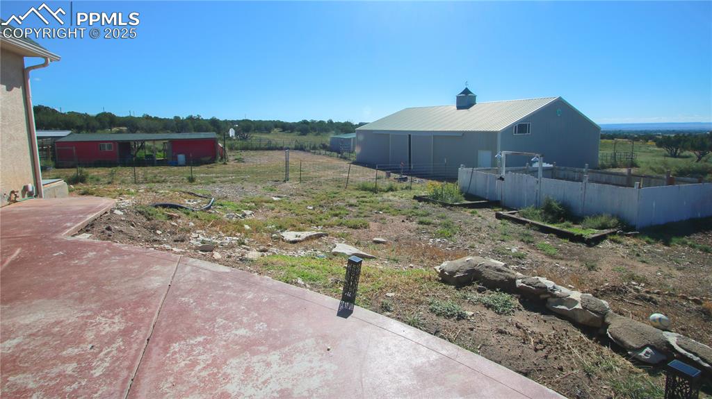 770 Cedar Hills Road Penrose, CO 81240 - Photo 37 of 49 a front view of a house with a yard