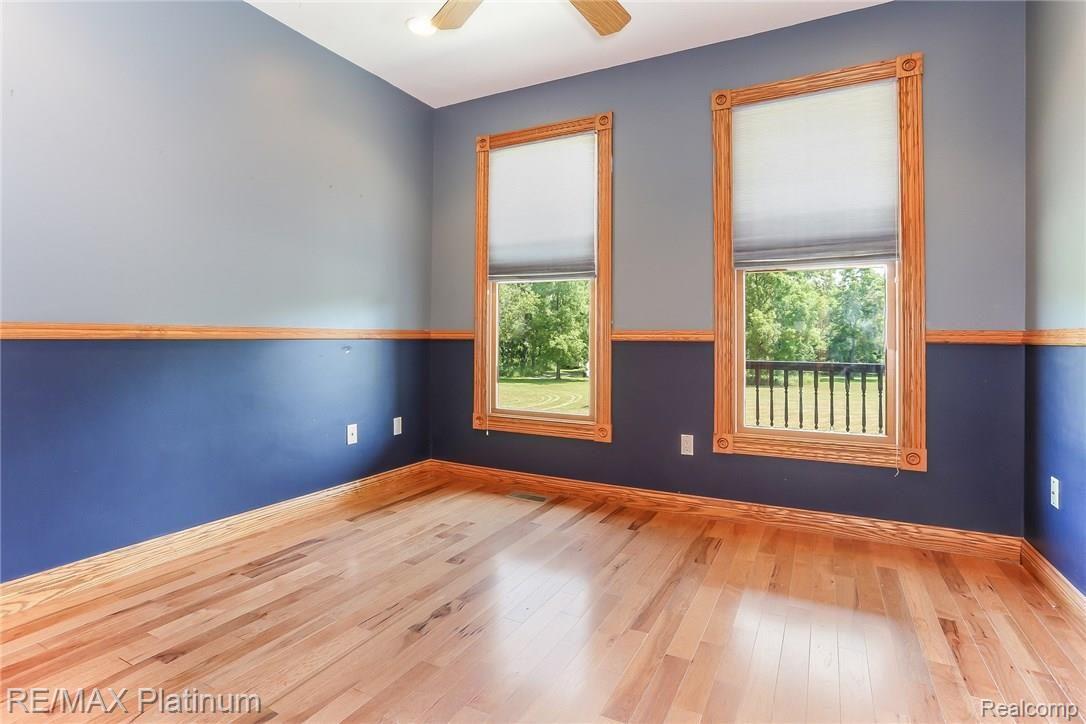 125 Keddle Road Howell, MI 48843 - Photo 17 of 35 Bedroom with views of back yard