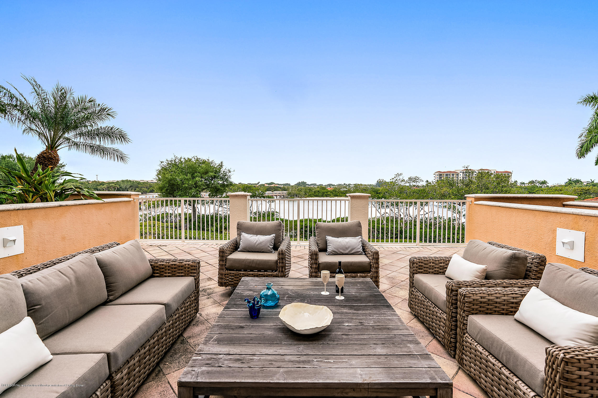 700 Highway 1, Unit 102 Jupiter, FL 33477 - Photo 14 of 36 a view of a patio with couches and potted plants