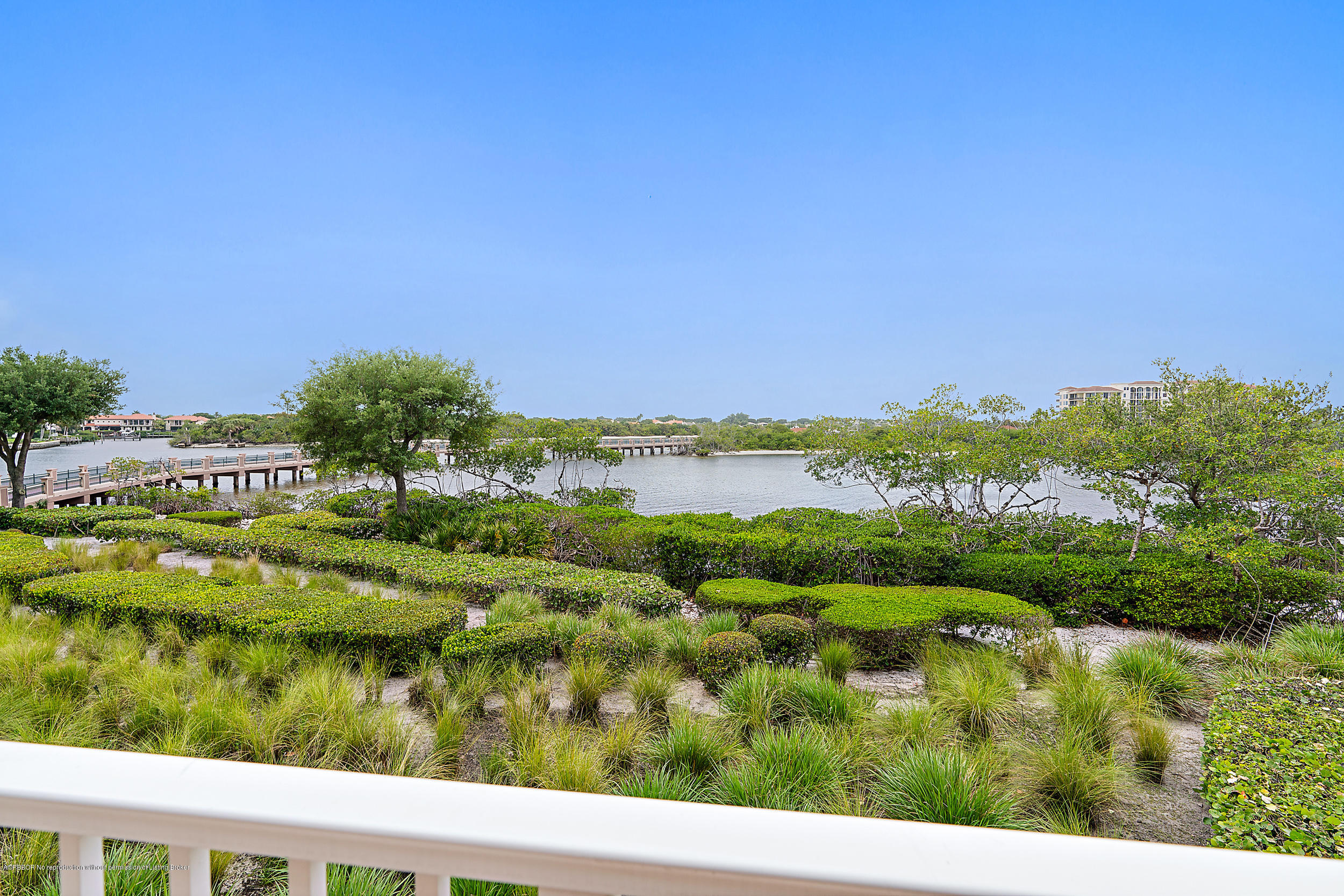 700 Highway 1, Unit 102 Jupiter, FL 33477 - Photo 15 of 36 a view of a lake with houses in the back