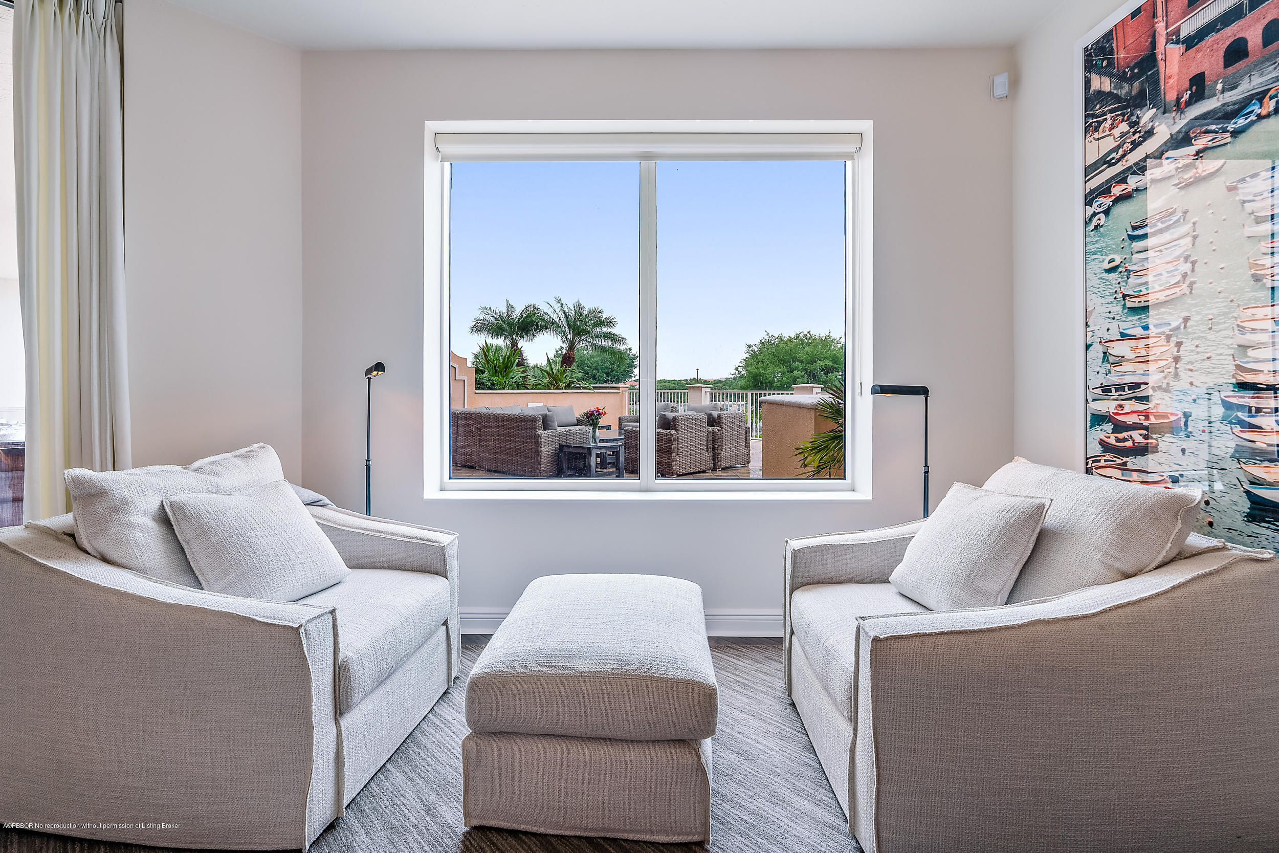700 Highway 1, Unit 102 Jupiter, FL 33477 - Photo 17 of 36 a living room with furniture and a potted plant