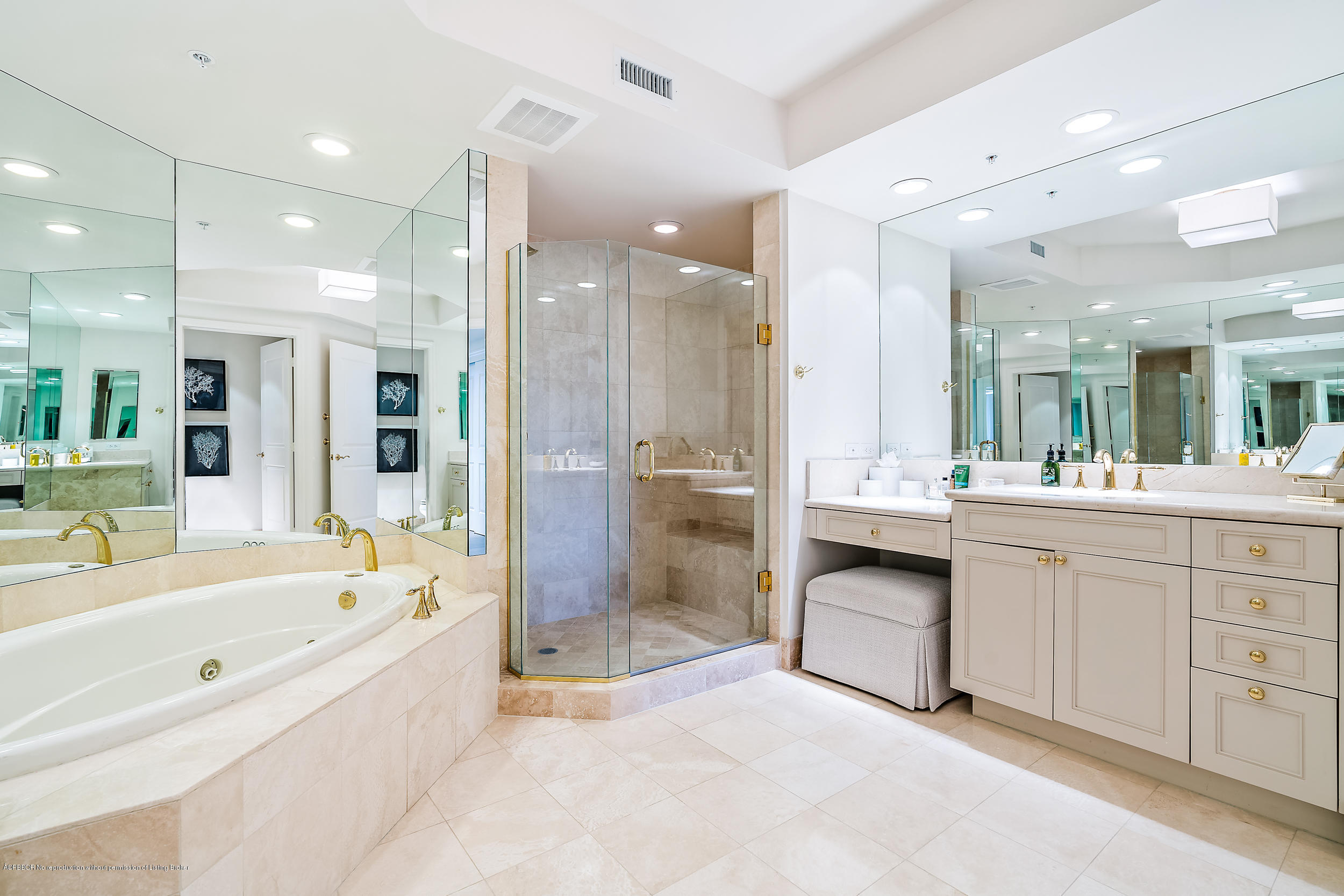 700 Highway 1, Unit 102 Jupiter, FL 33477 - Photo 19 of 36 a large spacious bathroom with a large tub shower and sink