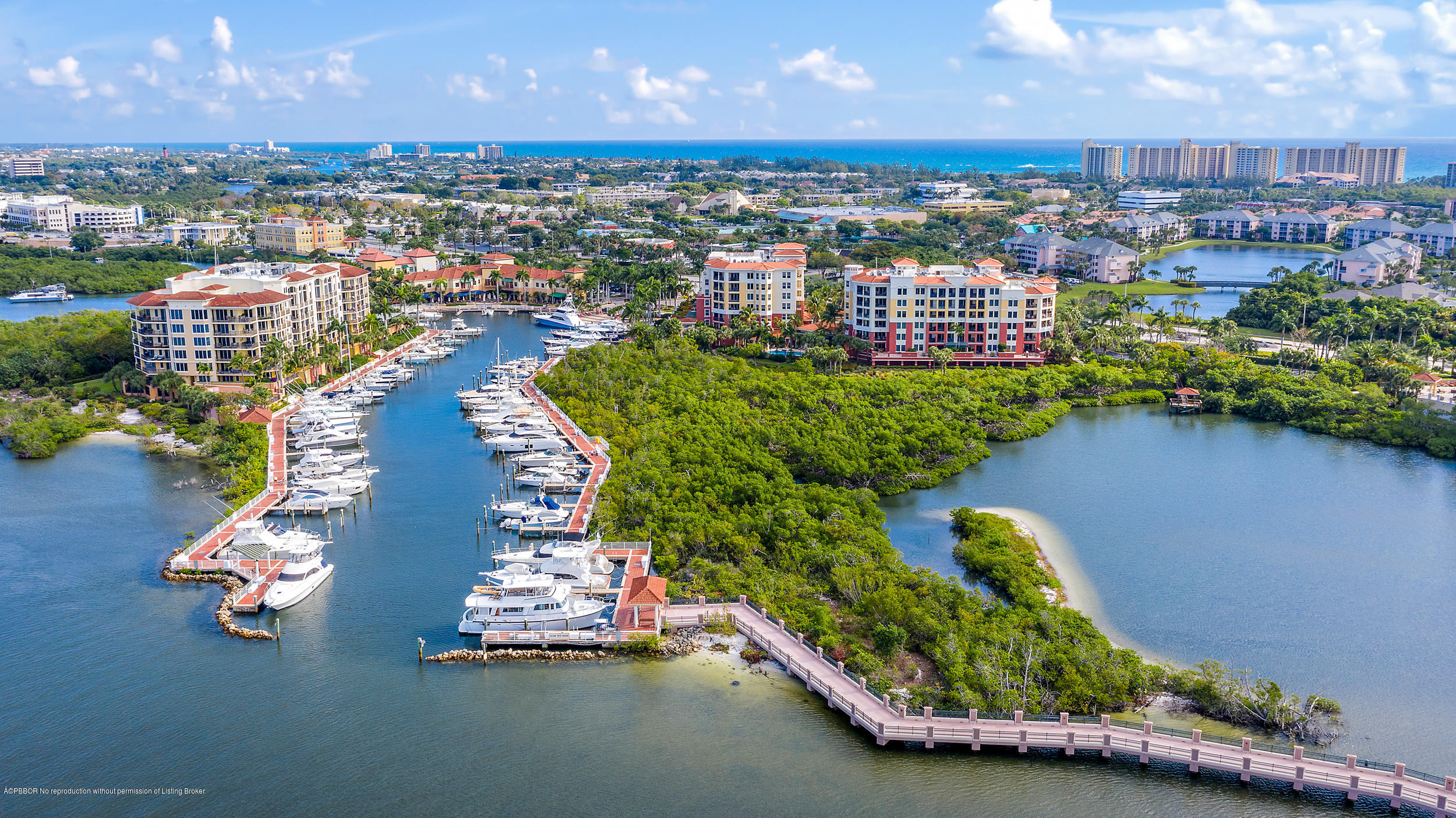 700 Highway 1, Unit 102 Jupiter, FL 33477 - Photo 33 of 36 an aerial view of a house with a garden and lake view