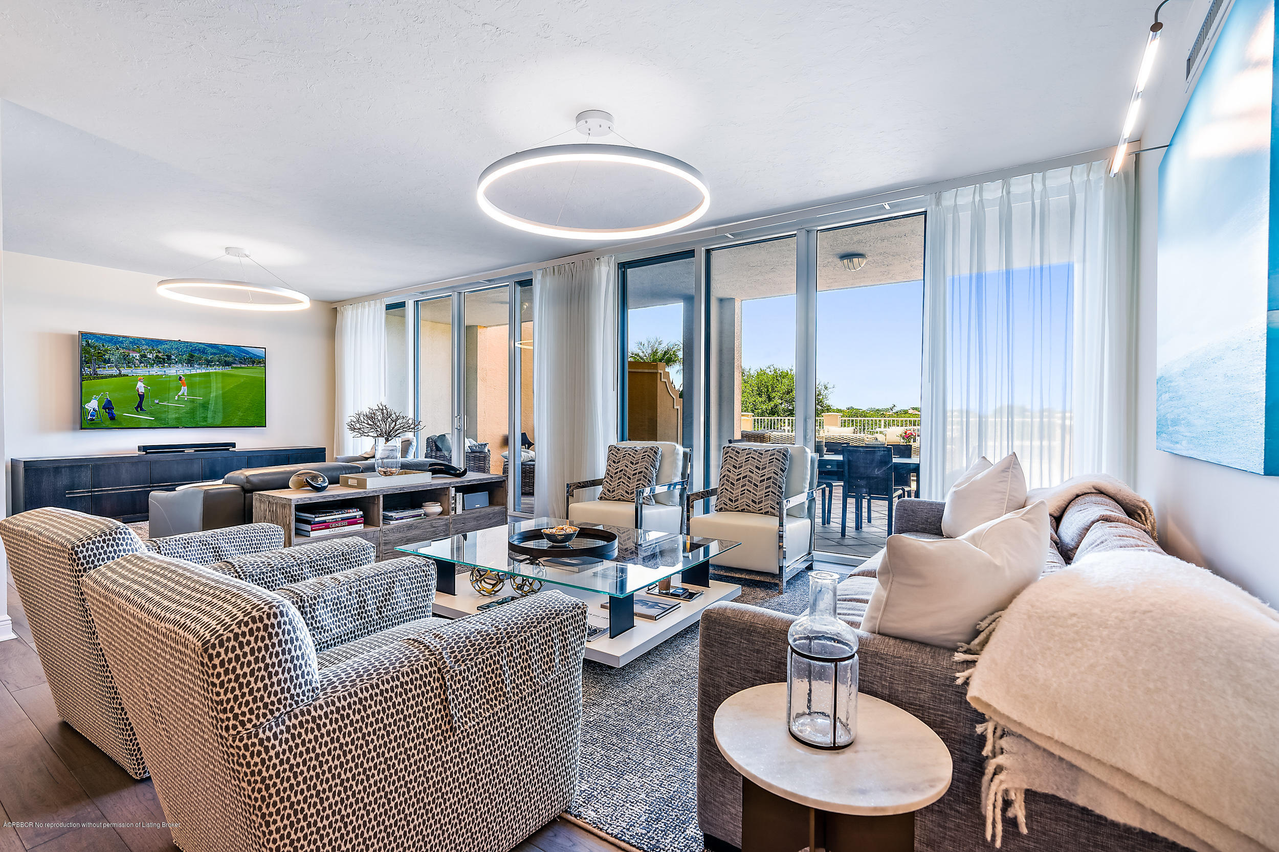 700 Highway 1, Unit 102 Jupiter, FL 33477 - Photo 6 of 36 a living room with furniture and a large window