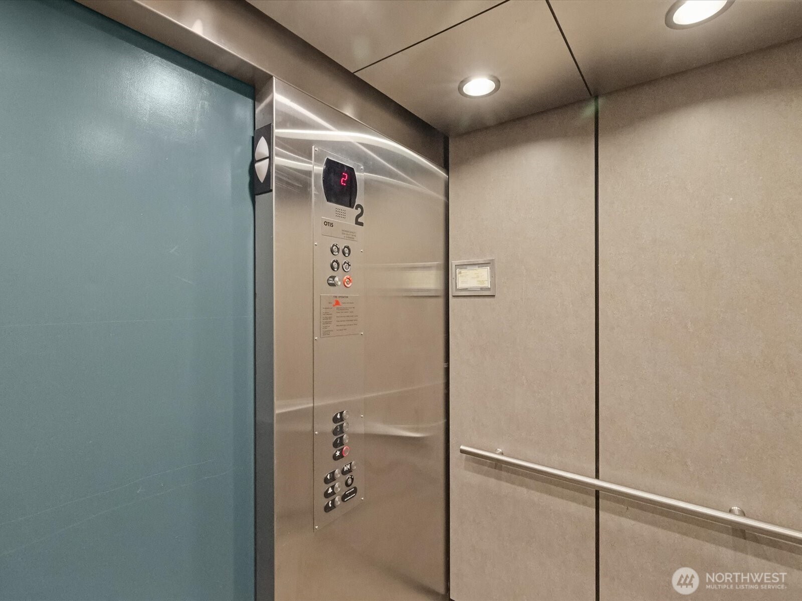 690 32nd Street, Unit B205 Bellingham, WA 98225 - Photo 11 of 40 a bathroom with a shower and a glass door