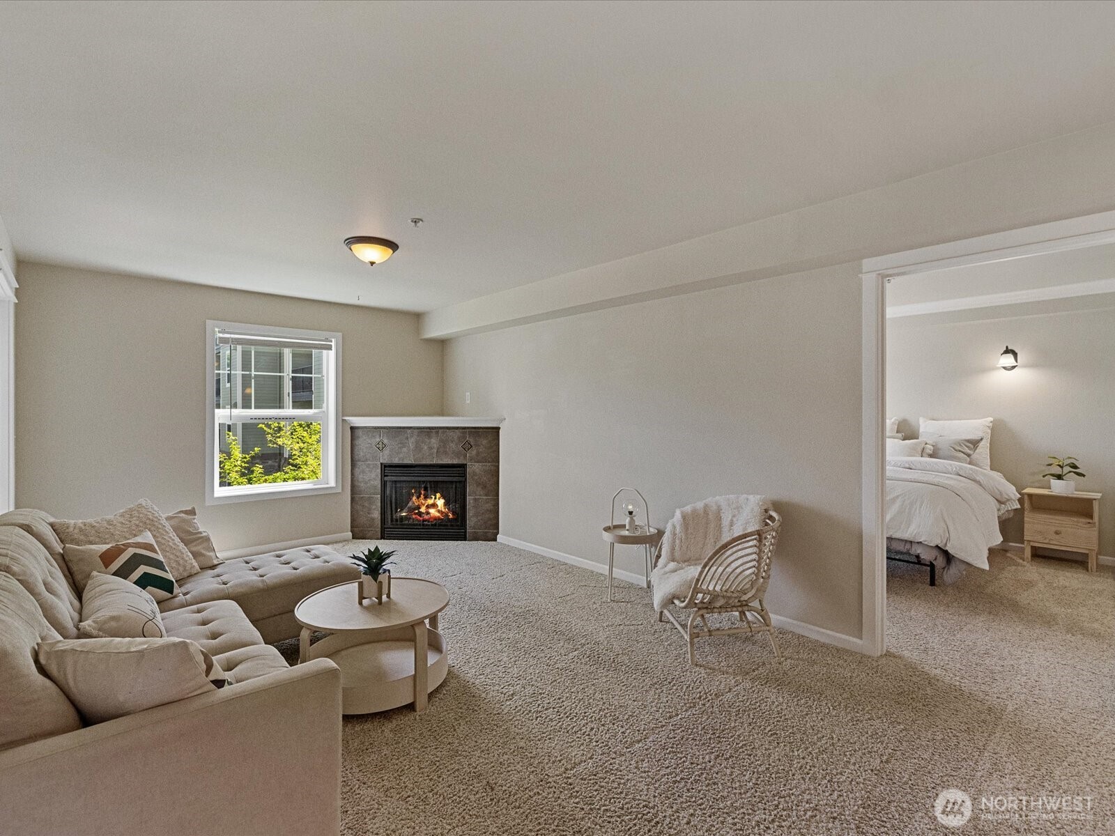690 32nd Street, Unit B205 Bellingham, WA 98225 - Photo 14 of 40 a living room with furniture and a fireplace