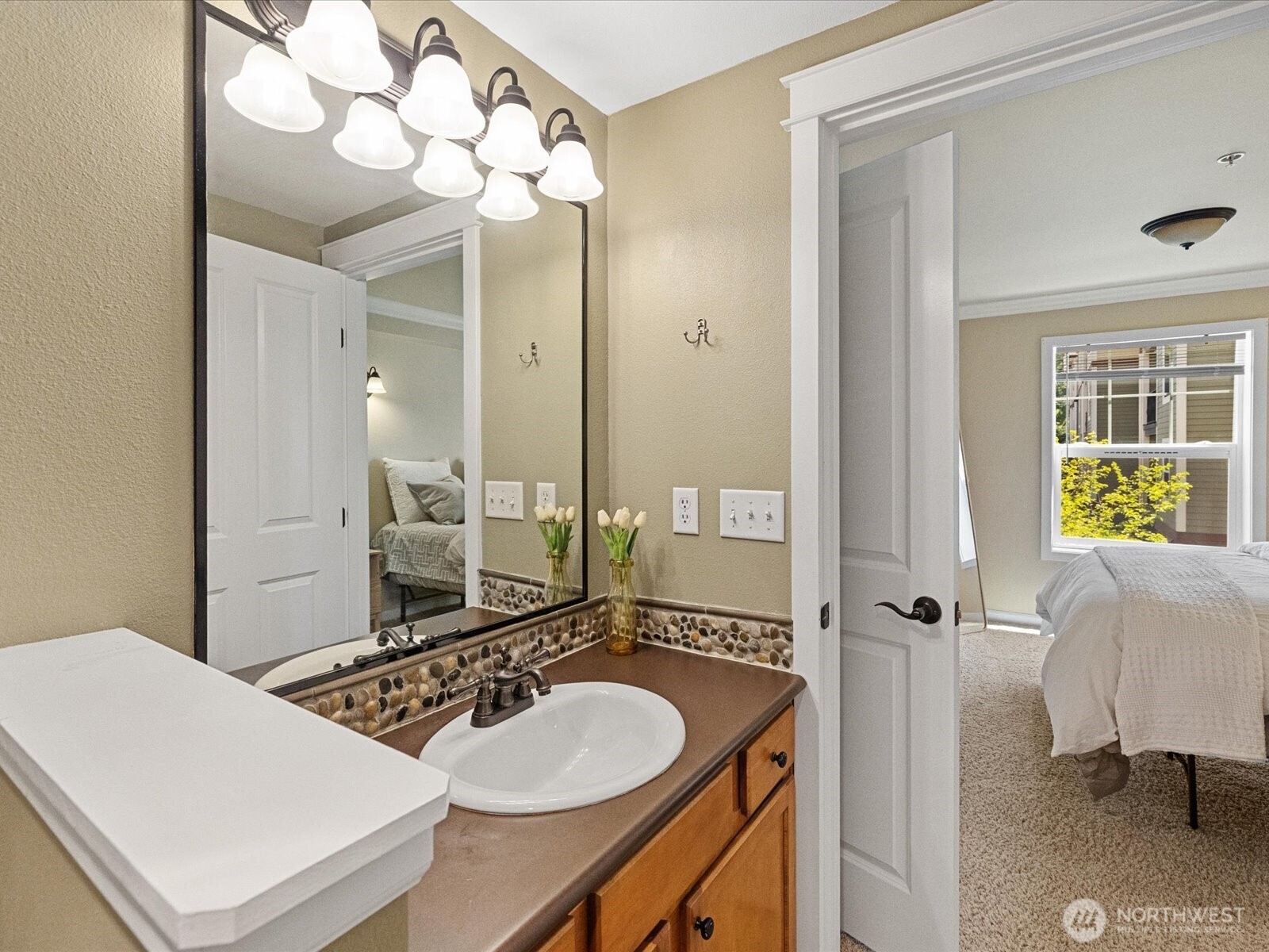 690 32nd Street, Unit B205 Bellingham, WA 98225 - Photo 22 of 40 a bathroom with a sink vanity and a mirror
