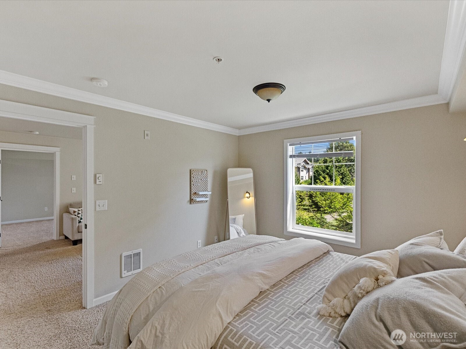 690 32nd Street, Unit B205 Bellingham, WA 98225 - Photo 24 of 40 a bedroom with a bed and a window