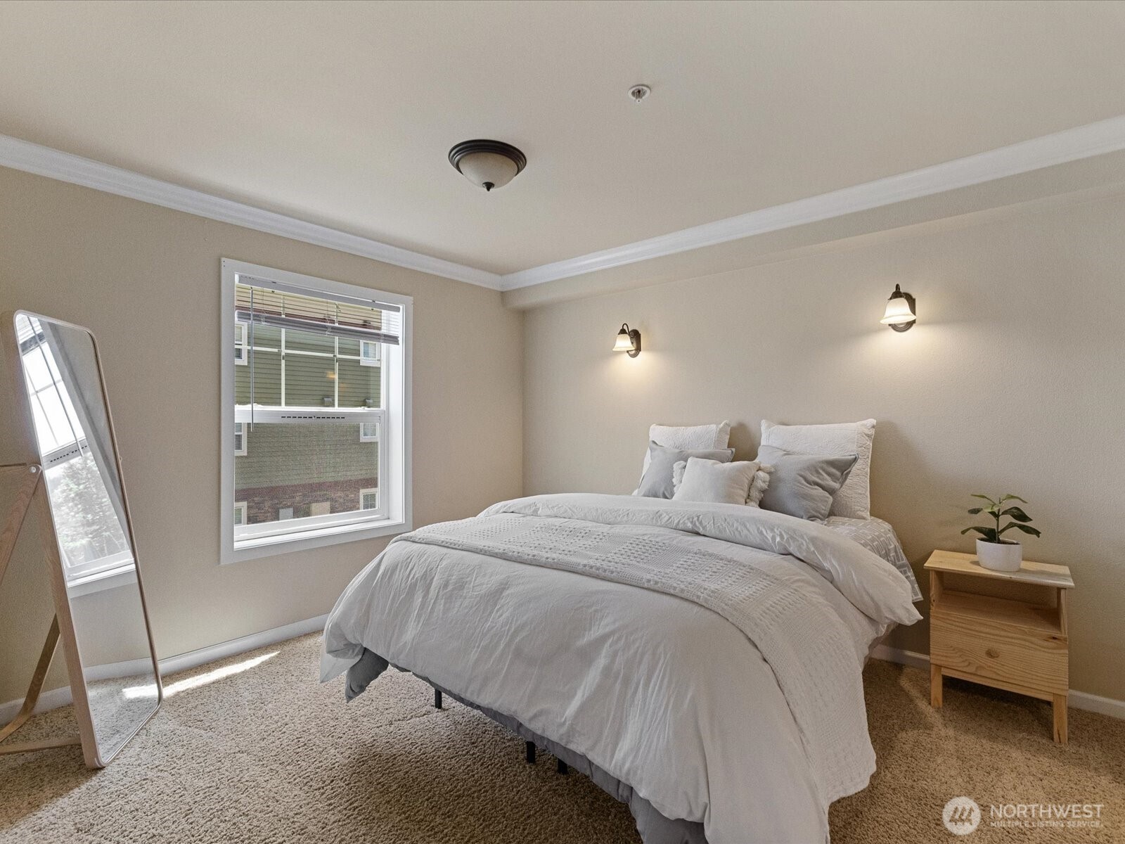690 32nd Street, Unit B205 Bellingham, WA 98225 - Photo 25 of 40 a bedroom with a bed and a window