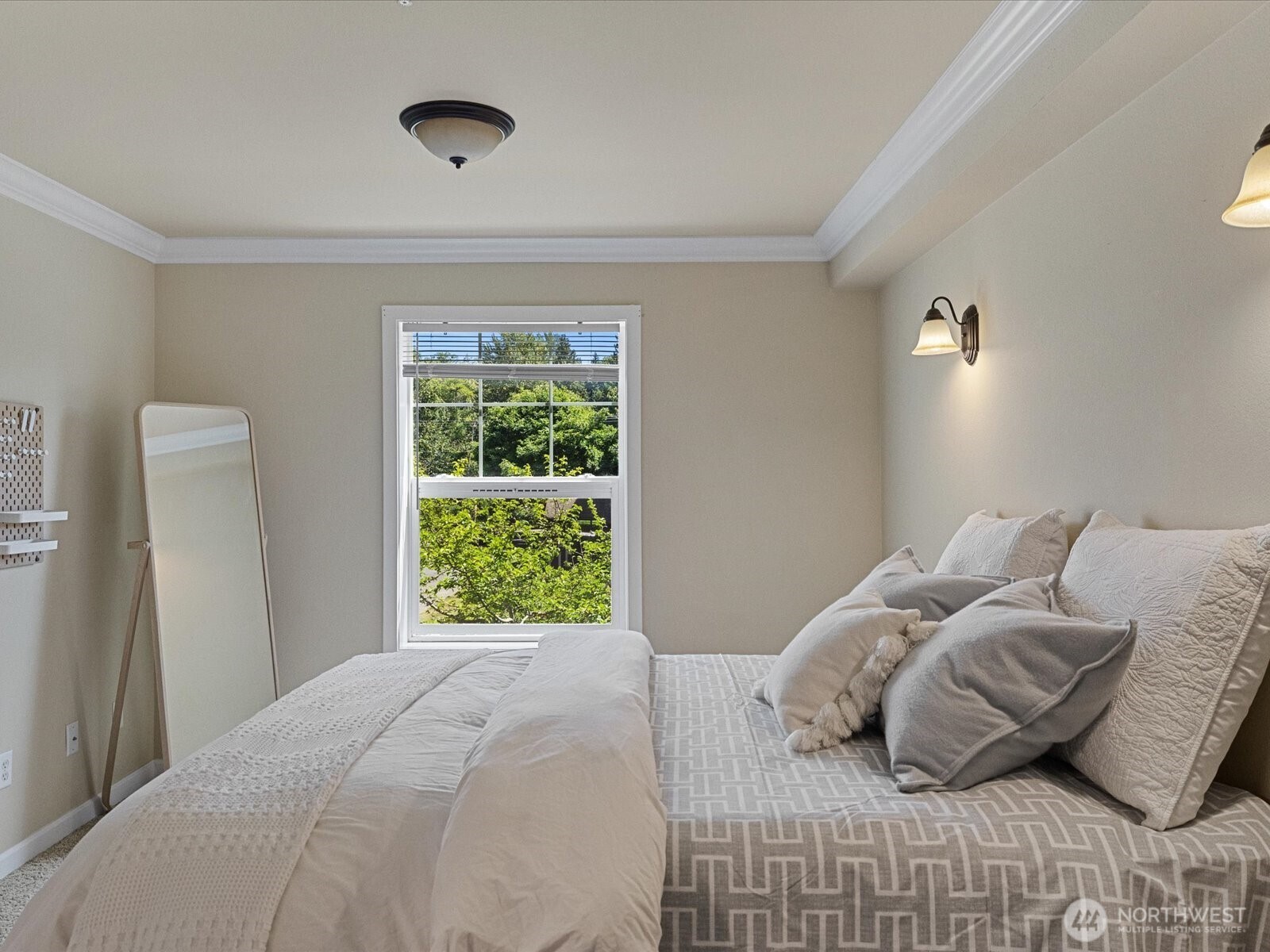 690 32nd Street, Unit B205 Bellingham, WA 98225 - Photo 26 of 40 a bedroom with a bed and a window
