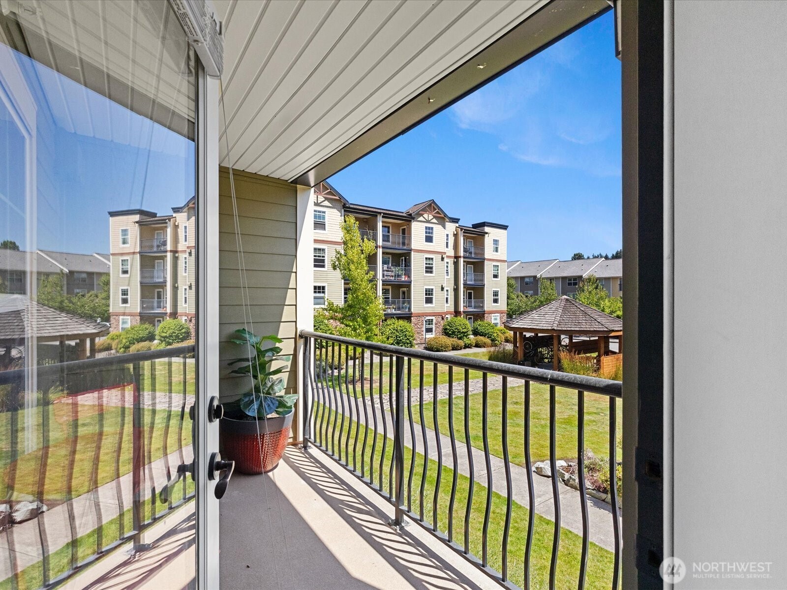 690 32nd Street, Unit B205 Bellingham, WA 98225 - Photo 28 of 40 a view of a balcony with a floor to ceiling window