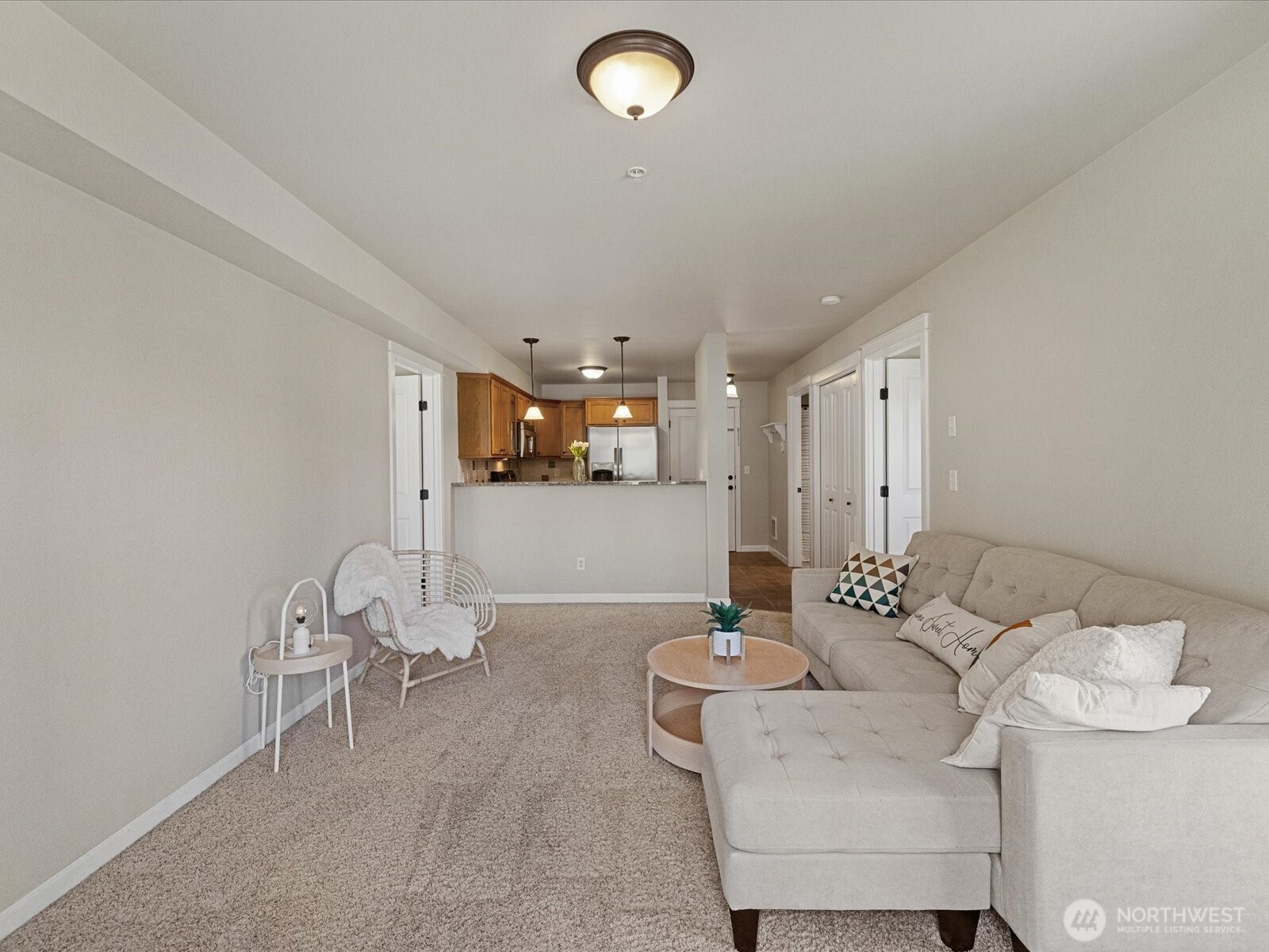 690 32nd Street, Unit B205 Bellingham, WA 98225 - Photo 30 of 40 a living room with furniture and a table