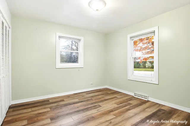 a view of a room that has a window in it