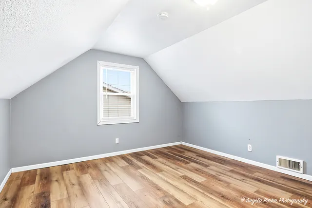 a view of a room with a window