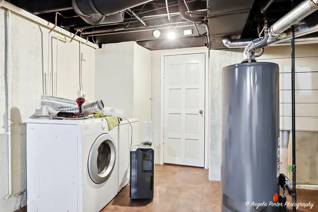 a view of a house with swimming pool and sitting area