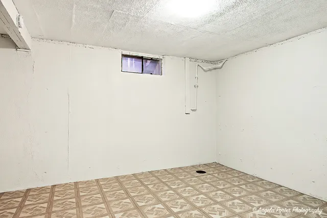 a view of a backyard with a sitting area