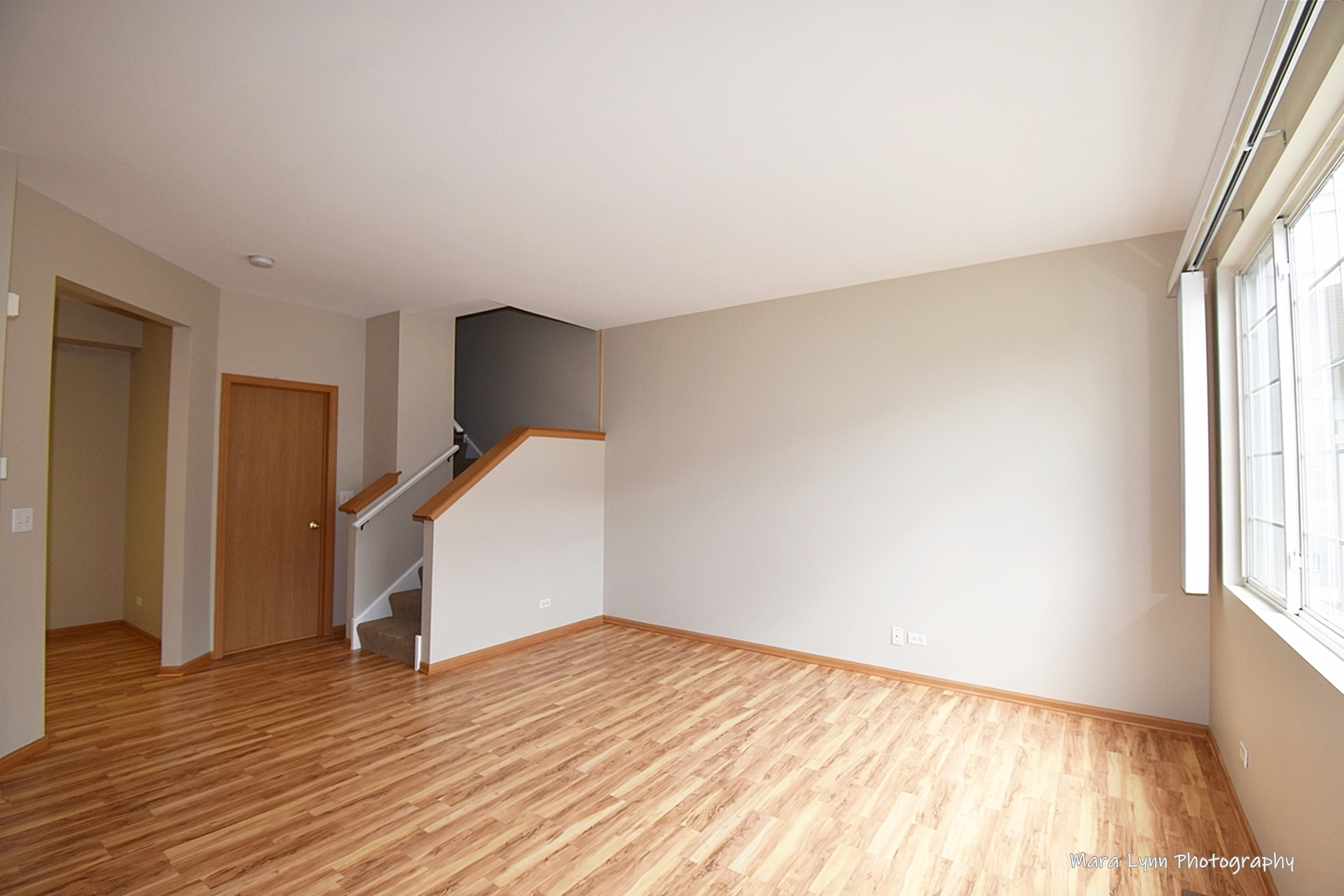 760 County Line Road Aurora, IL 60502 - Photo 10 of 25 a view of empty room with wooden floor and fan