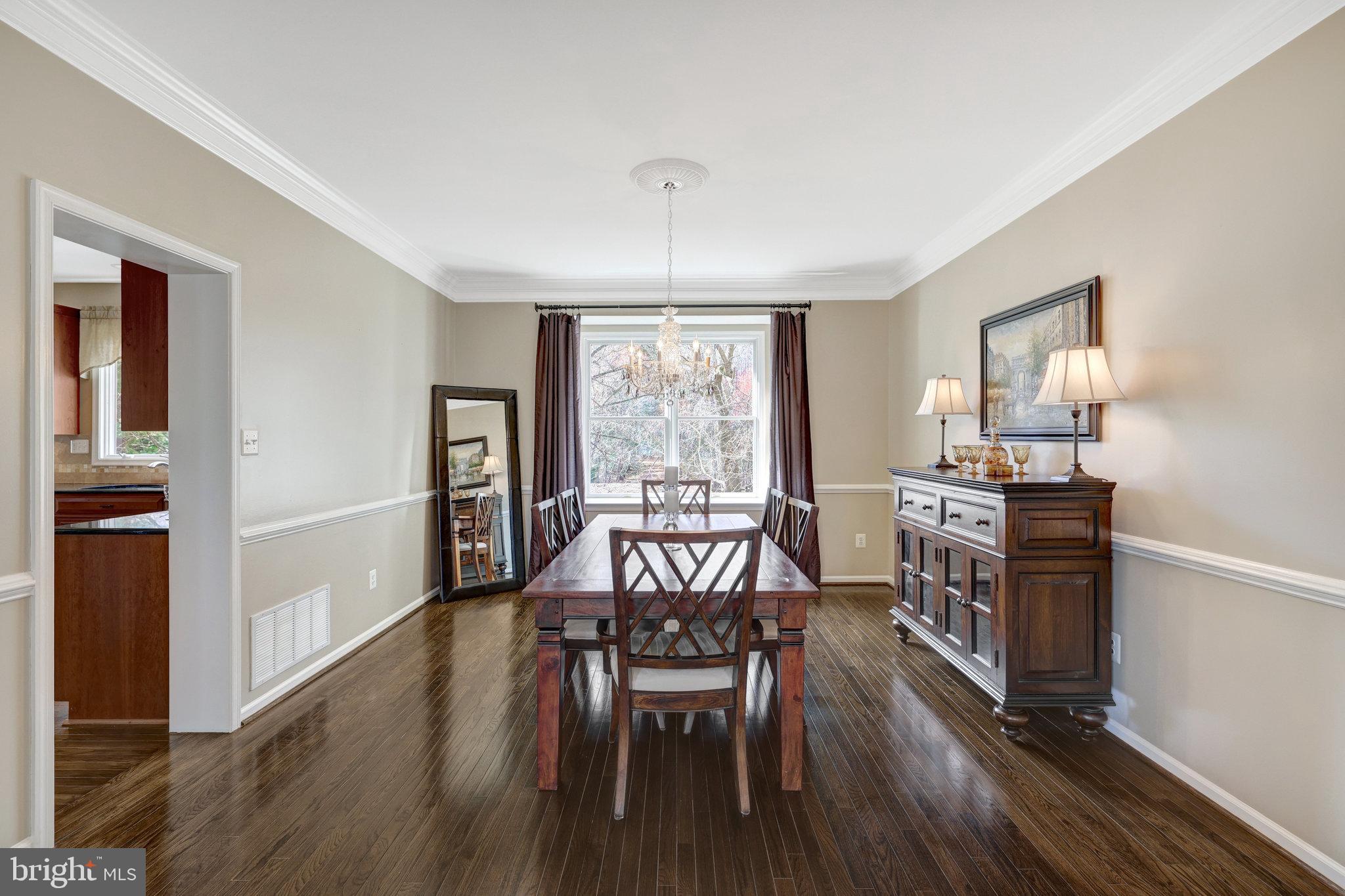 12513 Ridgegate Drive Herndon, VA 20170 - Photo 13 of 72 a dining room with furniture window wooden floor
