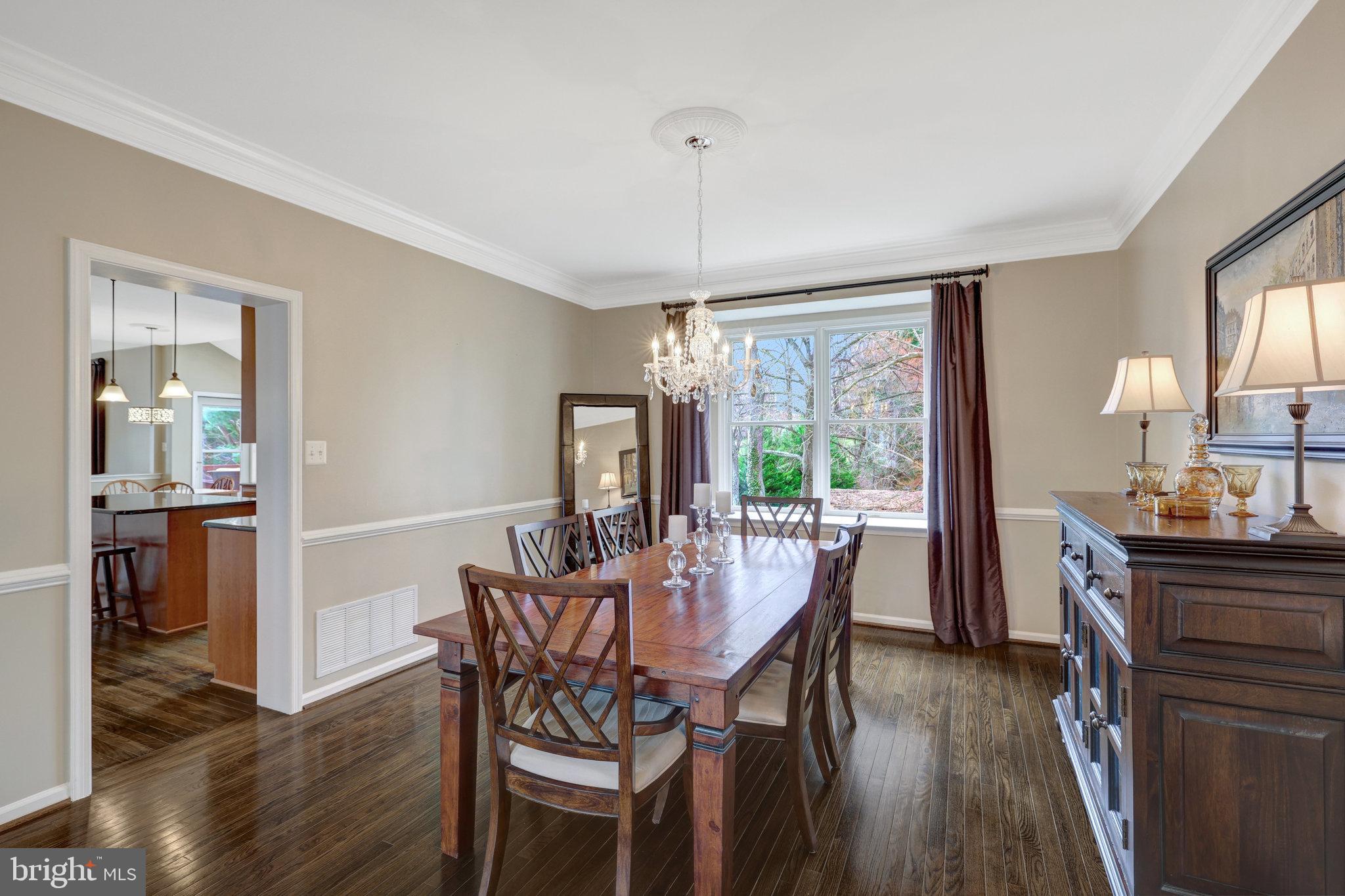 12513 Ridgegate Drive Herndon, VA 20170 - Photo 14 of 72 a dining room with furniture window wooden floor