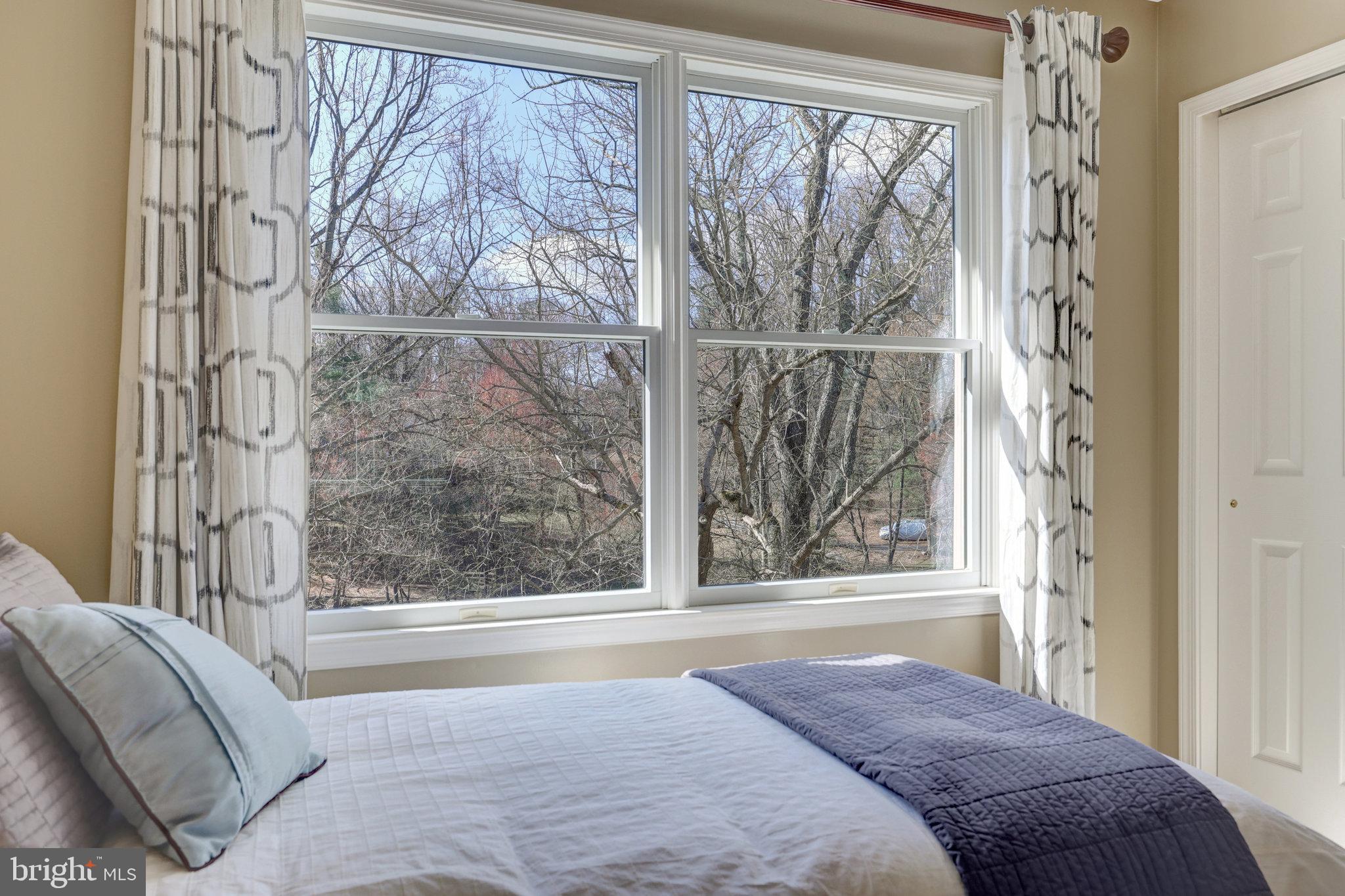 12513 Ridgegate Drive Herndon, VA 20170 - Photo 42 of 72 a bedroom with a bed and a window