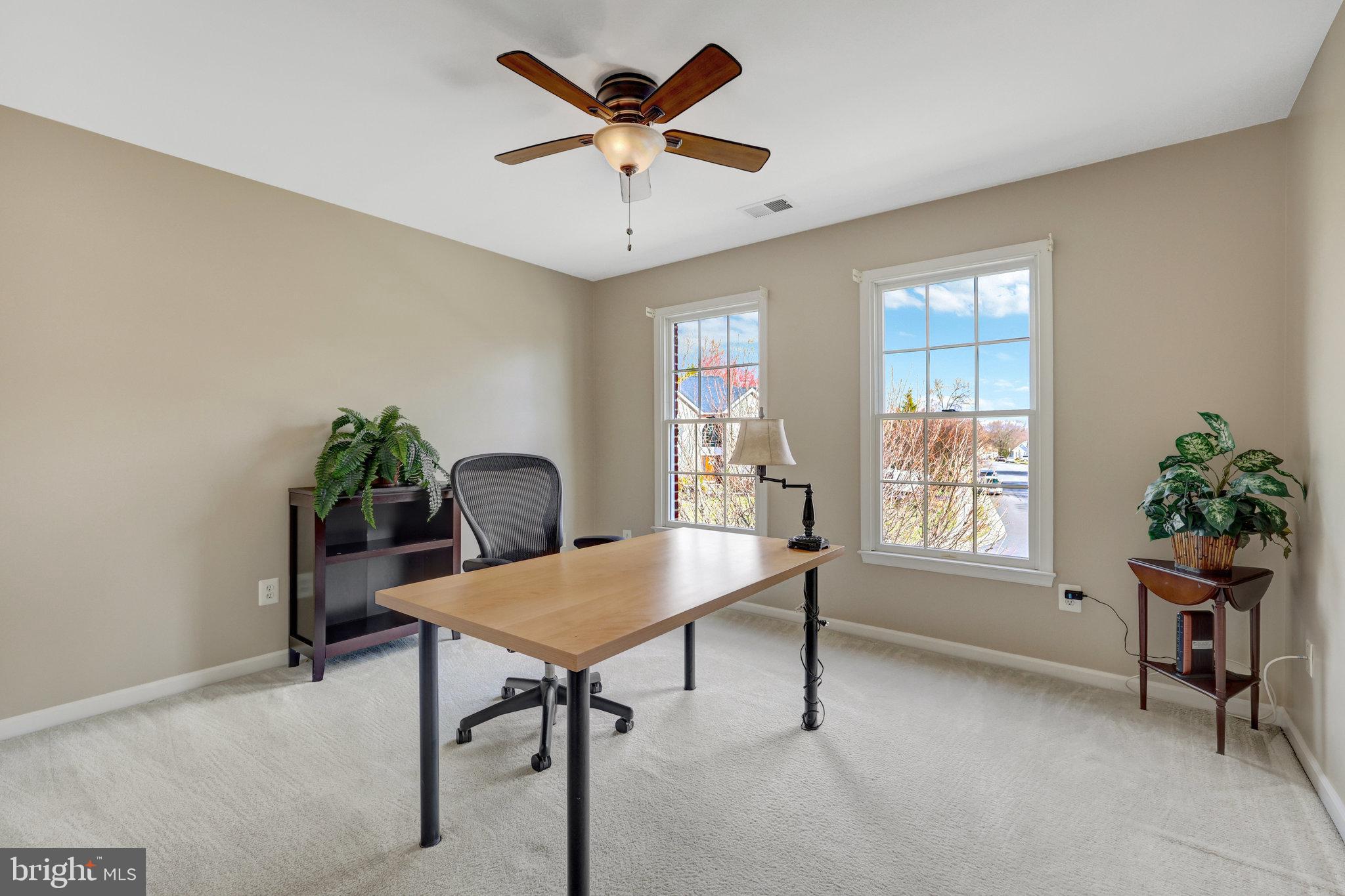 12513 Ridgegate Drive Herndon, VA 20170 - Photo 46 of 72 a workspace with furniture window and wooden floor