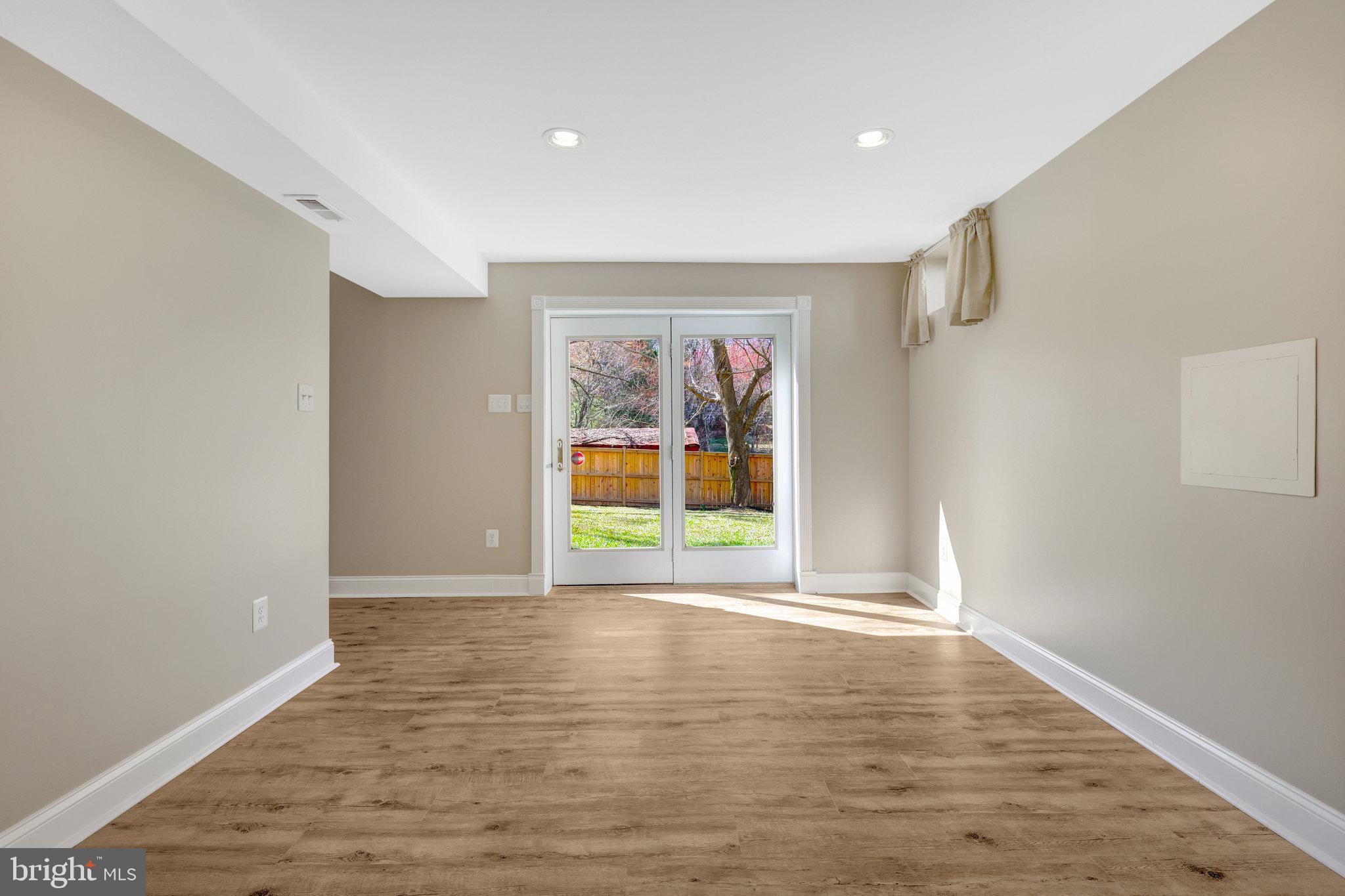 12513 Ridgegate Drive Herndon, VA 20170 - Photo 53 of 72 a view of an empty room with a window