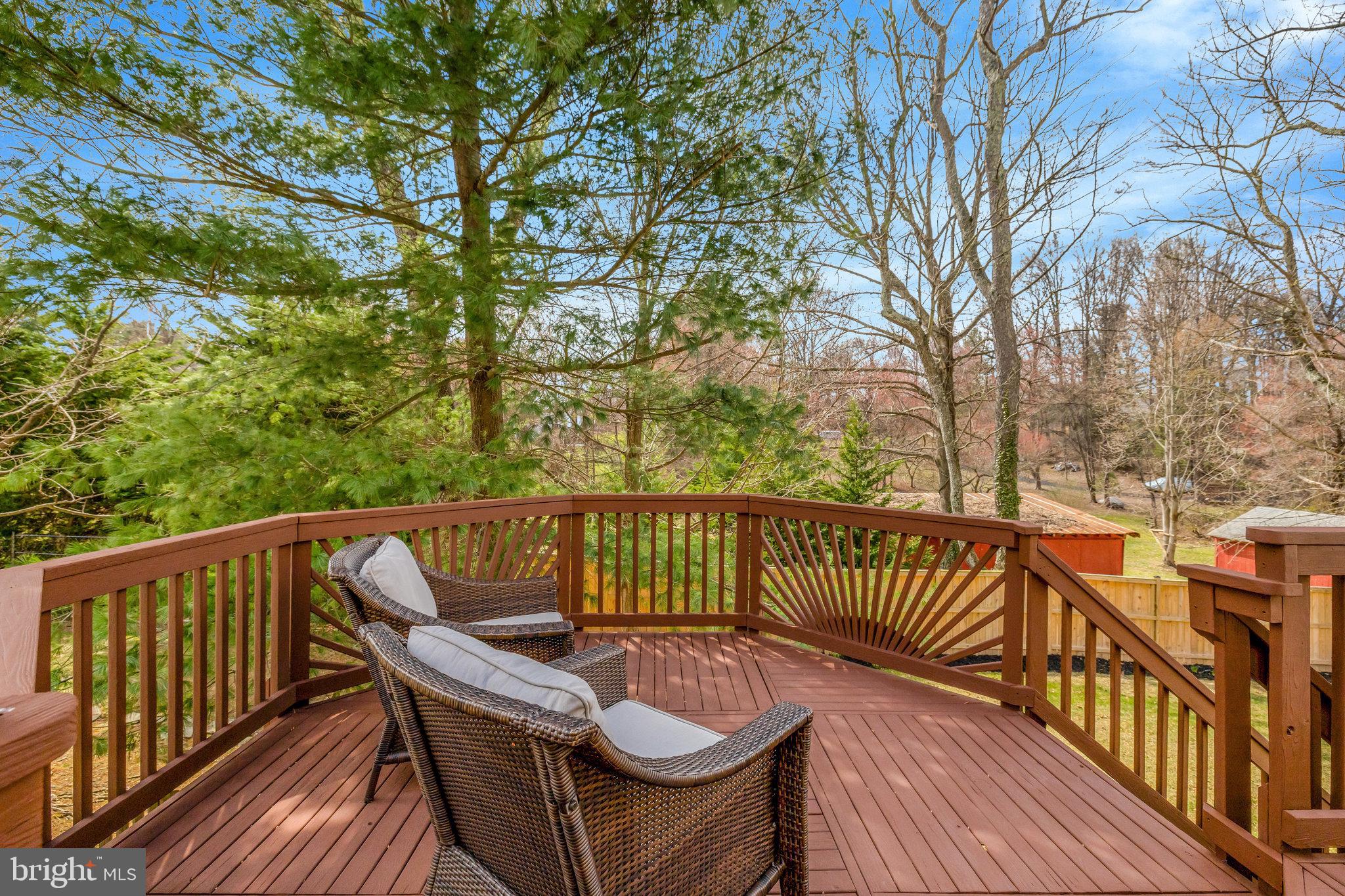 12513 Ridgegate Drive Herndon, VA 20170 - Photo 60 of 72 a view of balcony with wooden floor and outdoor seating