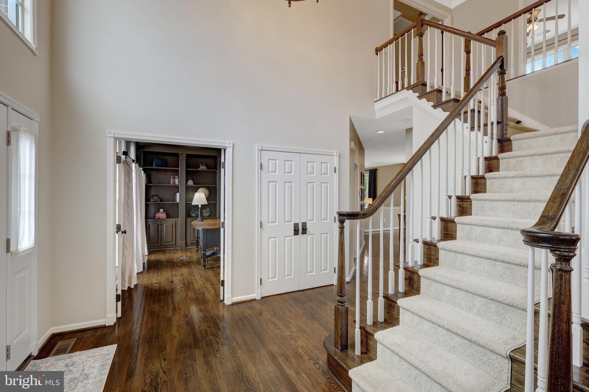 12513 Ridgegate Drive Herndon, VA 20170 - Photo 6 of 72 a view of entryway with wooden floor and stairs