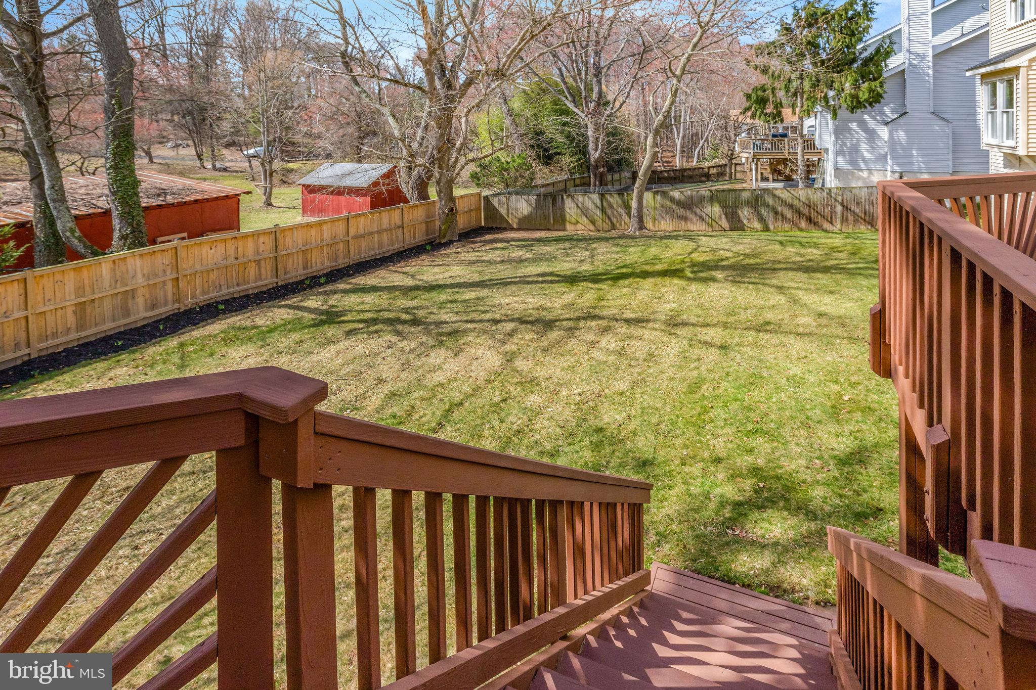 12513 Ridgegate Drive Herndon, VA 20170 - Photo 64 of 72 a view of a yard with wooden fence