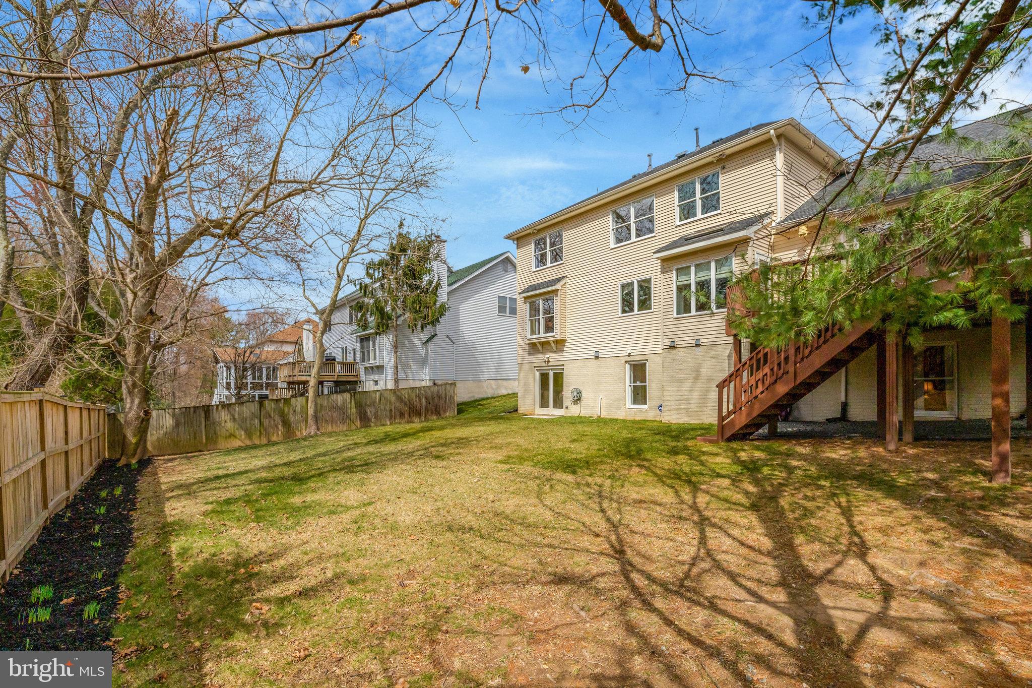 12513 Ridgegate Drive Herndon, VA 20170 - Photo 68 of 72 a backyard of a house