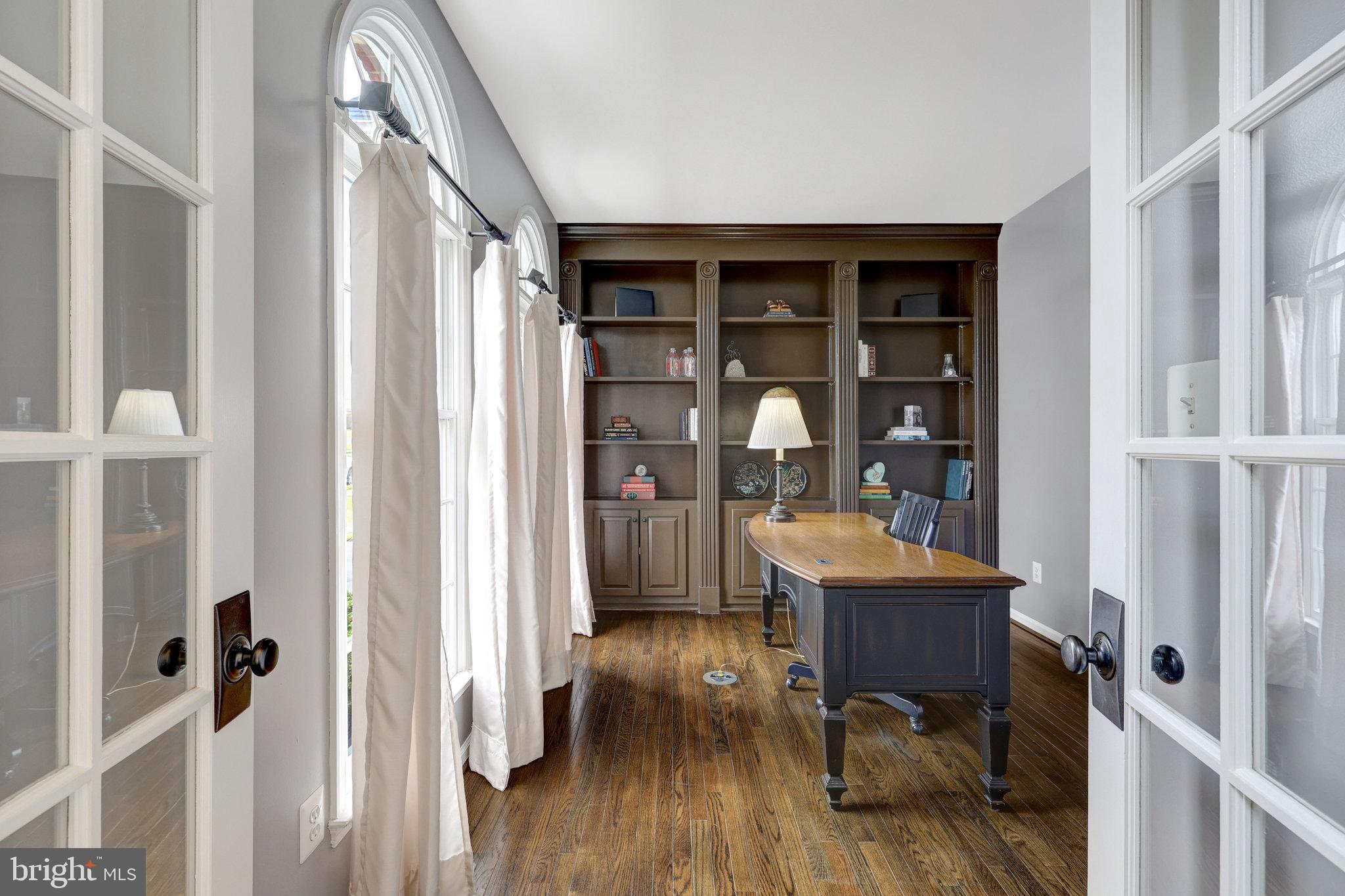 12513 Ridgegate Drive Herndon, VA 20170 - Photo 8 of 72 a view of a workspace with furniture and wooden floor