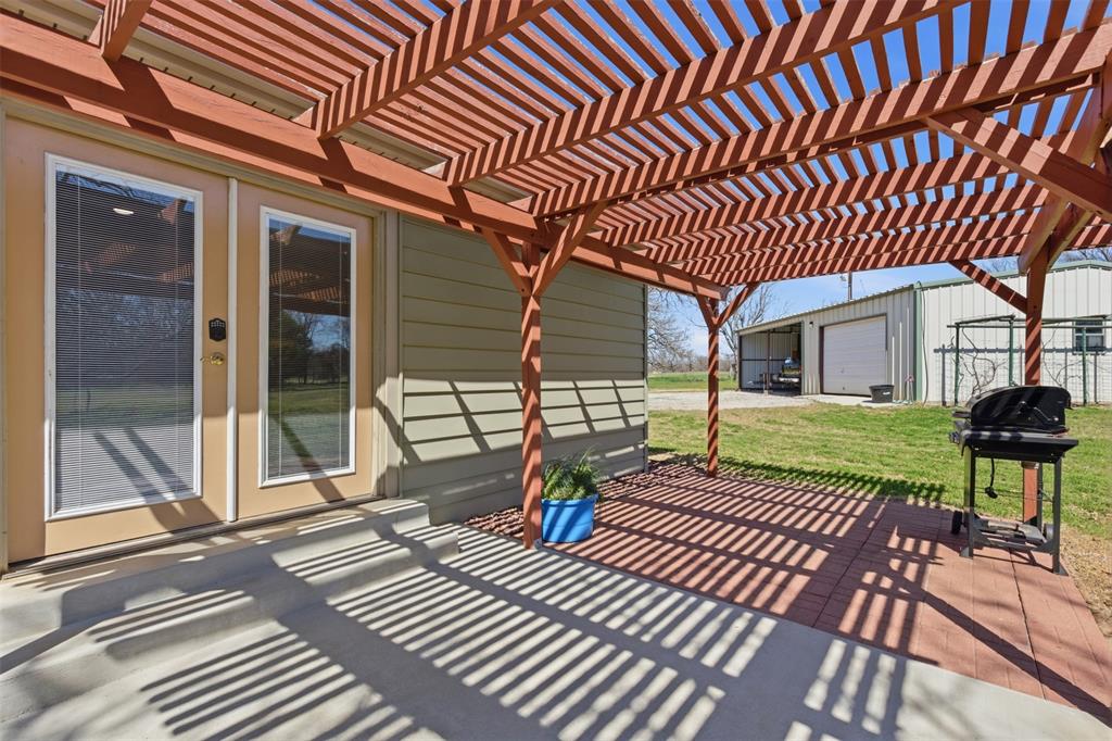 755 County Road 4280 Decatur, TX 76234 - Photo 30 of 36 a view of a patio with wooden floor