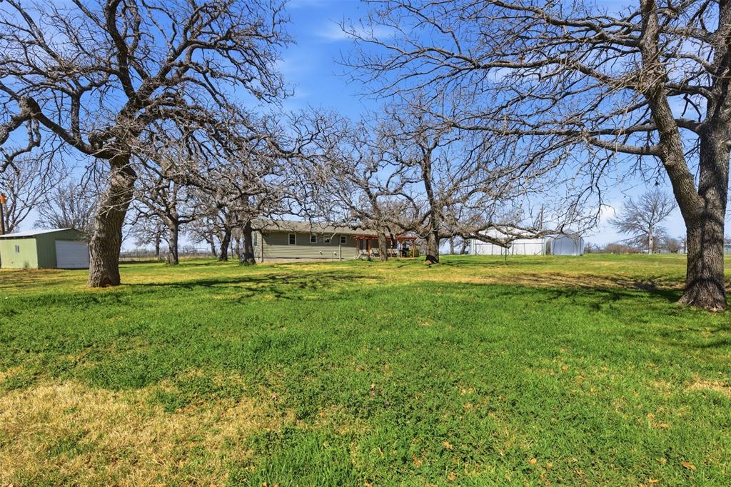 755 County Road 4280 Decatur, TX 76234 - Photo 31 of 36 a view of swimming pool with tree s