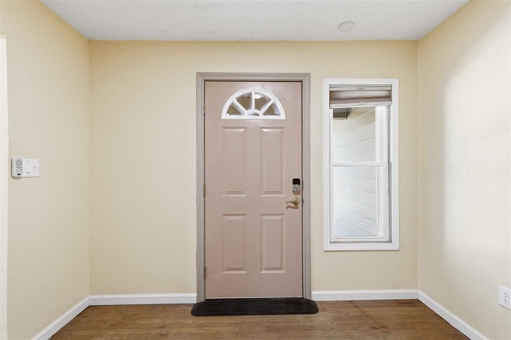 755 County Road 4280 Decatur, TX 76234 - Photo 6 of 36 a view of an entryway with wooden floor