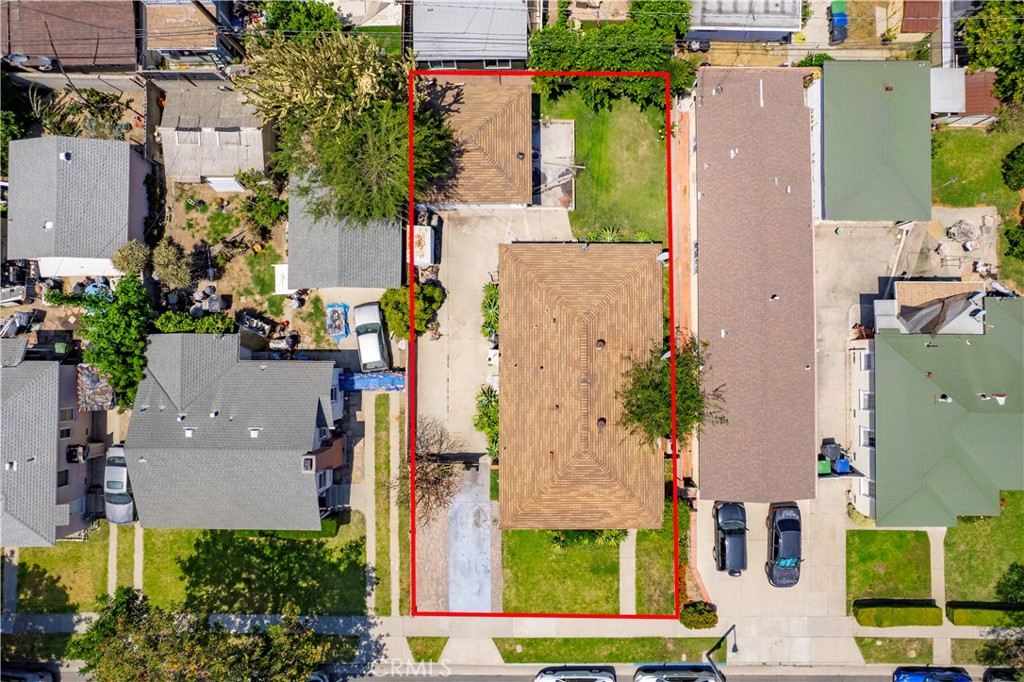 2725 East Tyler Street Carson, CA 90810 - Photo 30 of 30 an aerial view of residential houses with outdoor space and parking