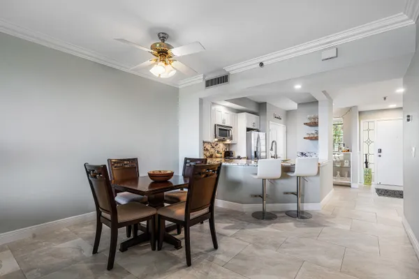 a view of a dining room with furniture